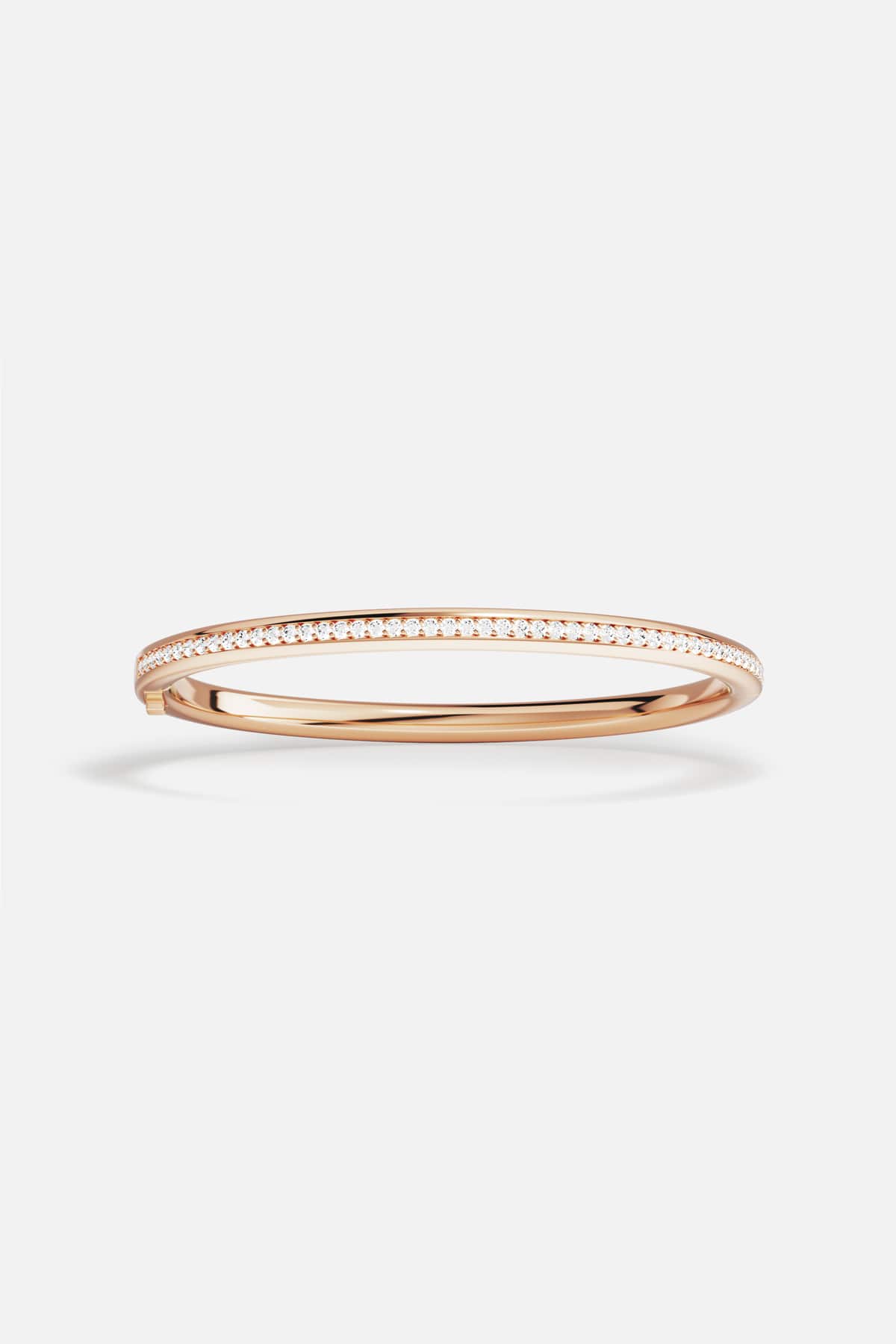 APM Bangle in rose color, a sleek shimmer for effortless elegance.