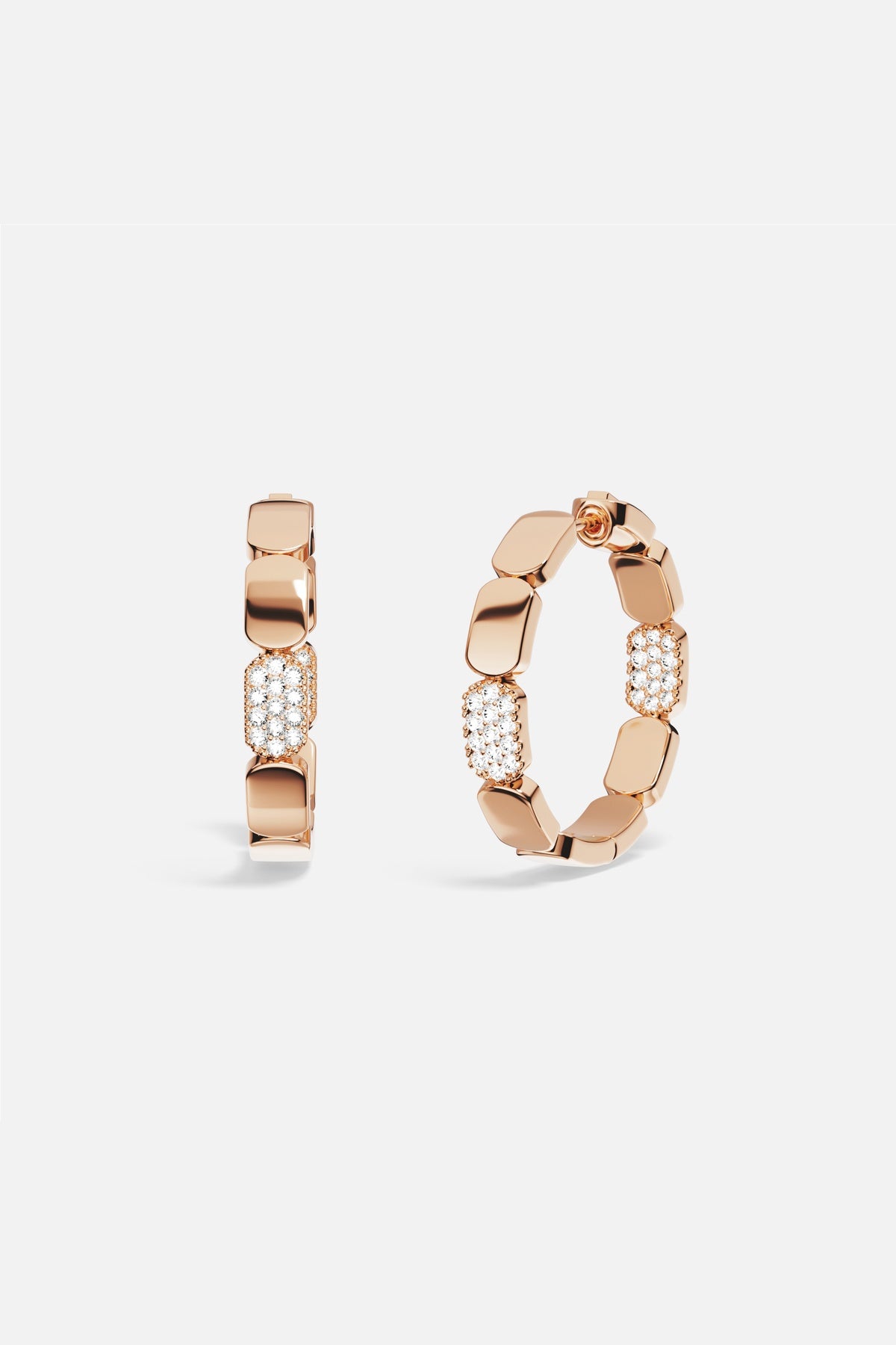 APM Hoop Earrings in warm rose color, sculpted links meet a shimmering pavé glow.