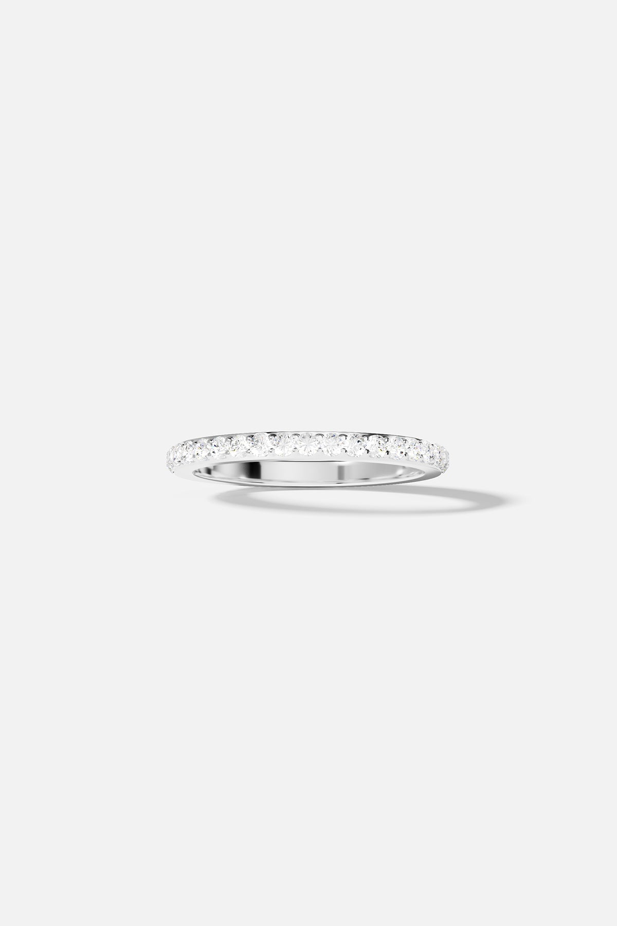 APM Ring, a delicate line of shimmer in rhodium finish.