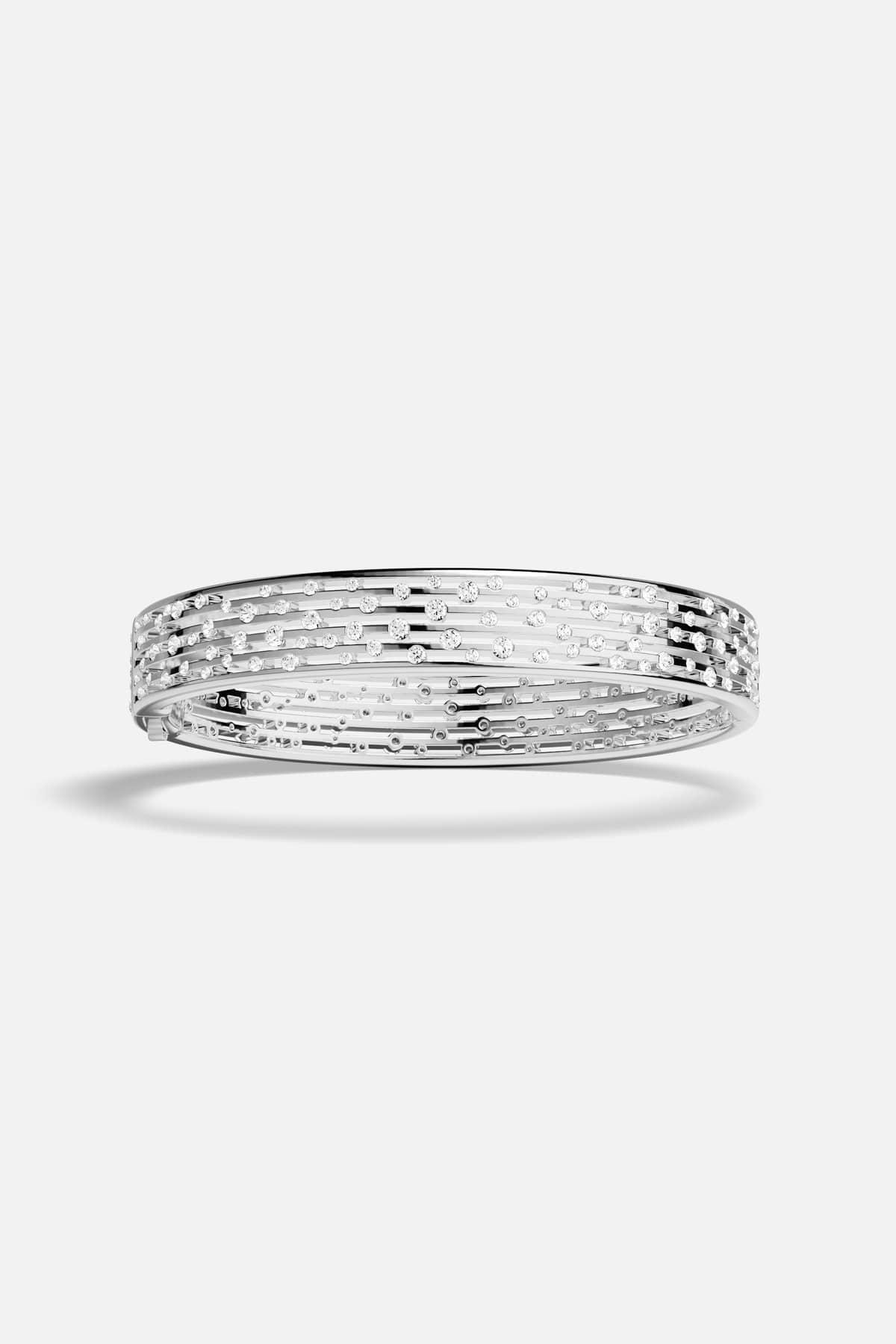 APM Bangle in rhodium finish, a scattered shimmer of quiet, radiant elegance.