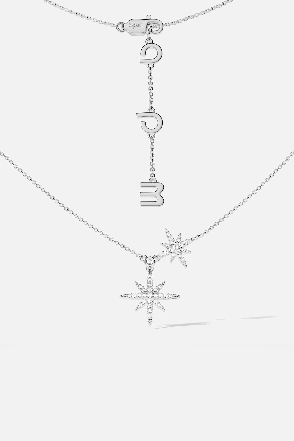 APM Météorites Necklace, twin stars shimmering in rhodium finish, effortlessly celestial.