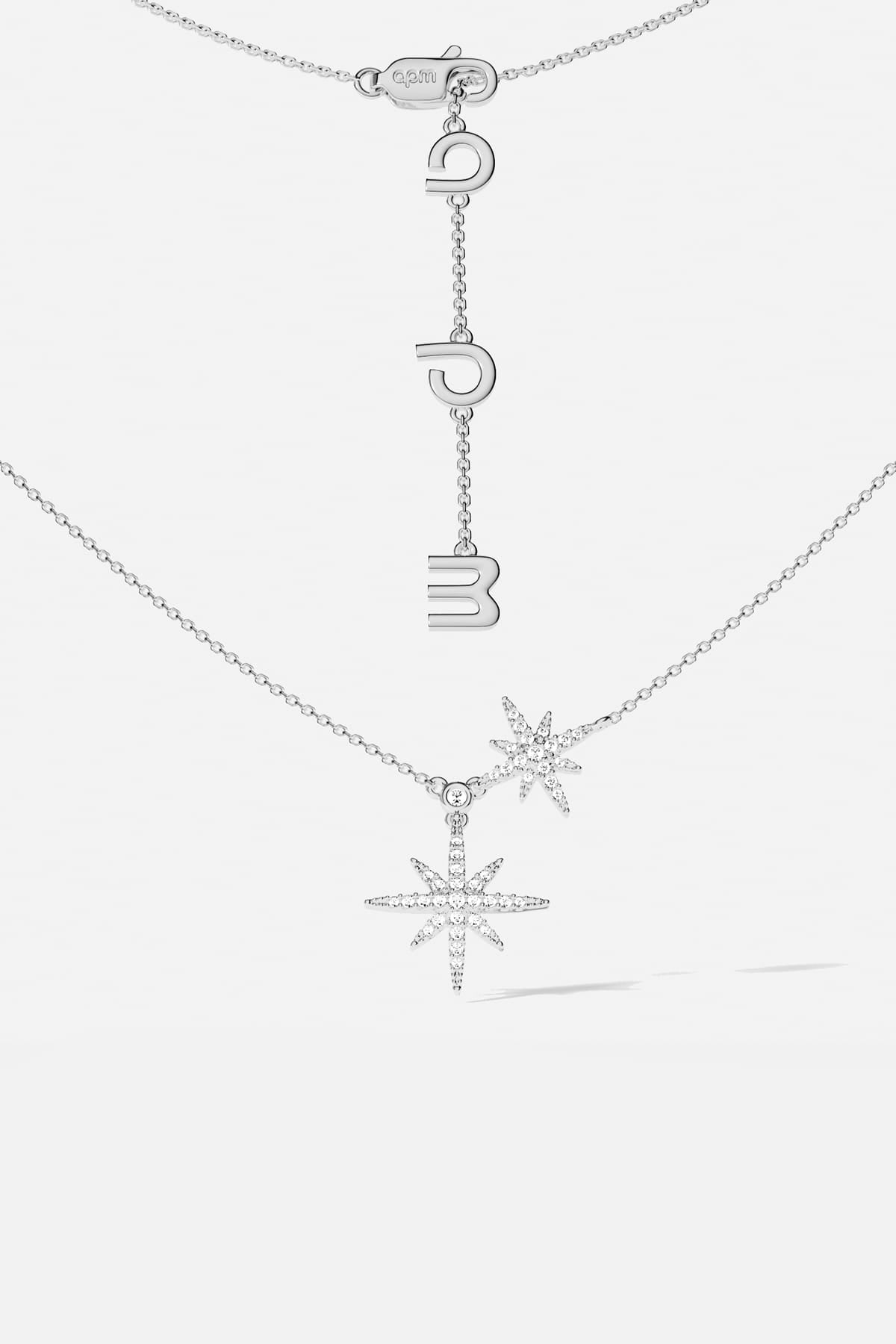 APM Météorites Necklace, twin stars shimmering in rhodium finish, effortlessly celestial.