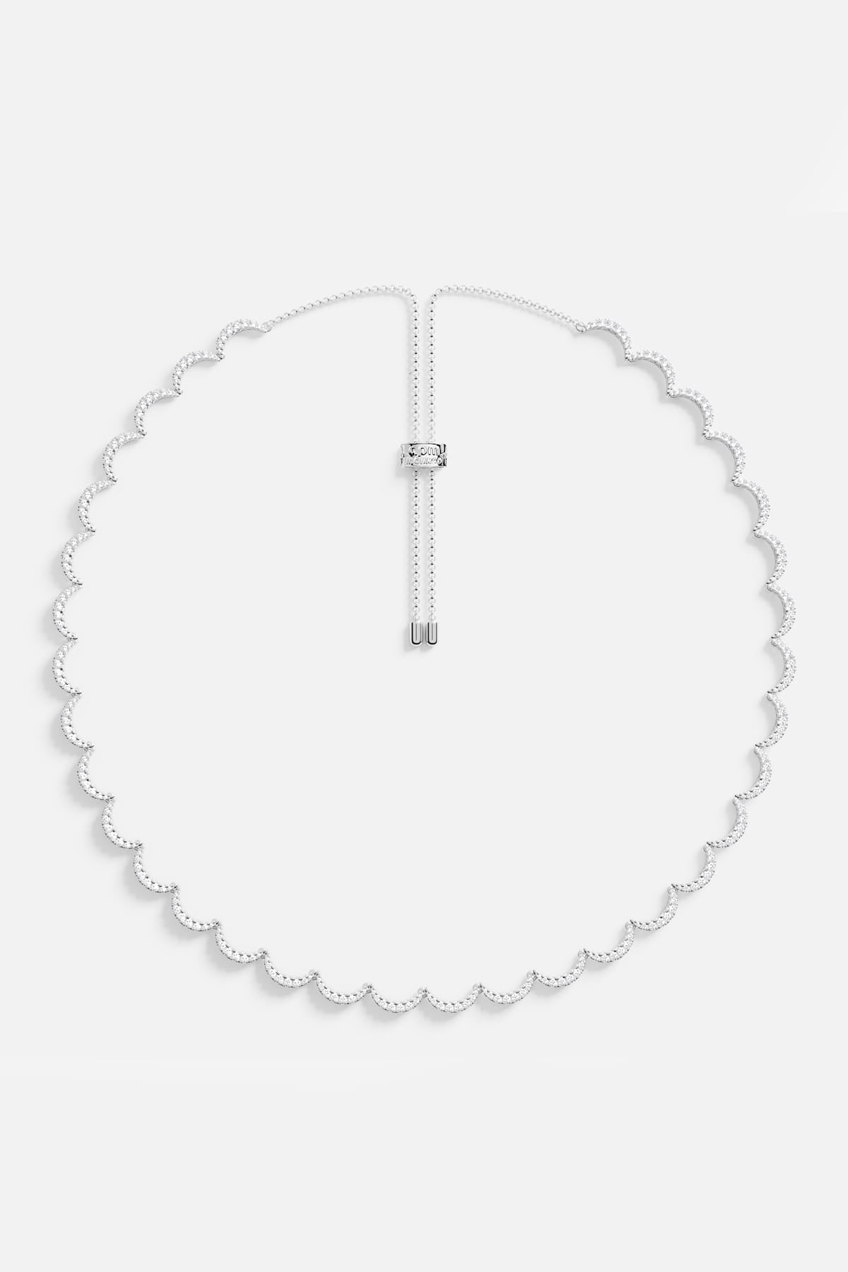 APM Necklace with scalloped shimmer, a delicate wave of light around the neck.