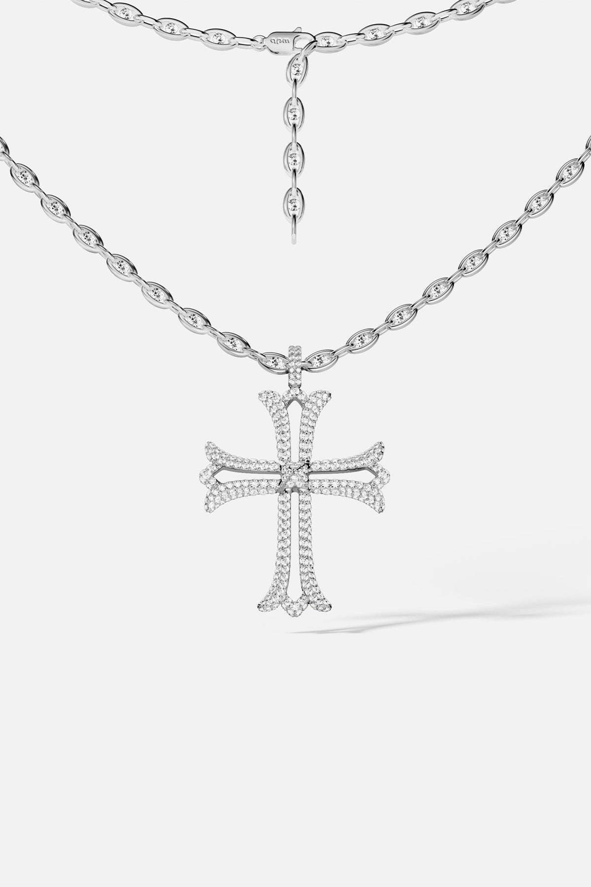 APM Cross Necklace, luminous sparkle meets timeless grace in rhodium finish.