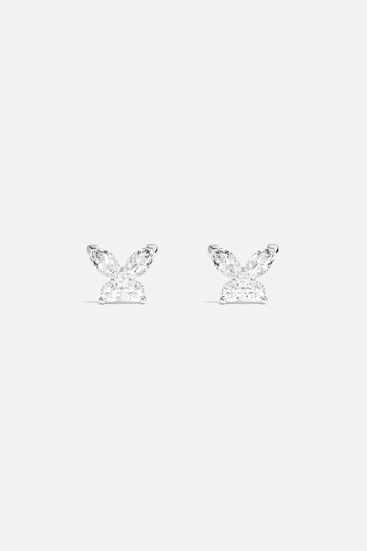 APM Butterfly Earrings, a delicate flutter of light and effortless charm.