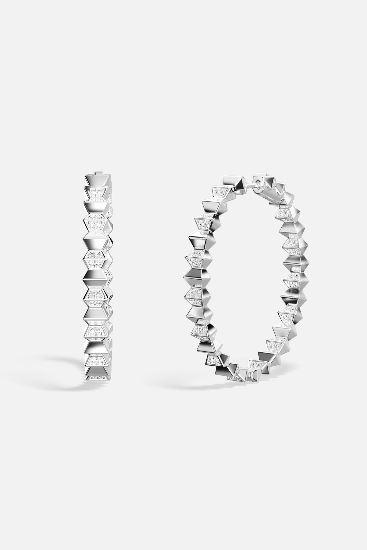 APM Hoop Earrings, edgy spikes in rhodium finish, bold and effortlessly chic.