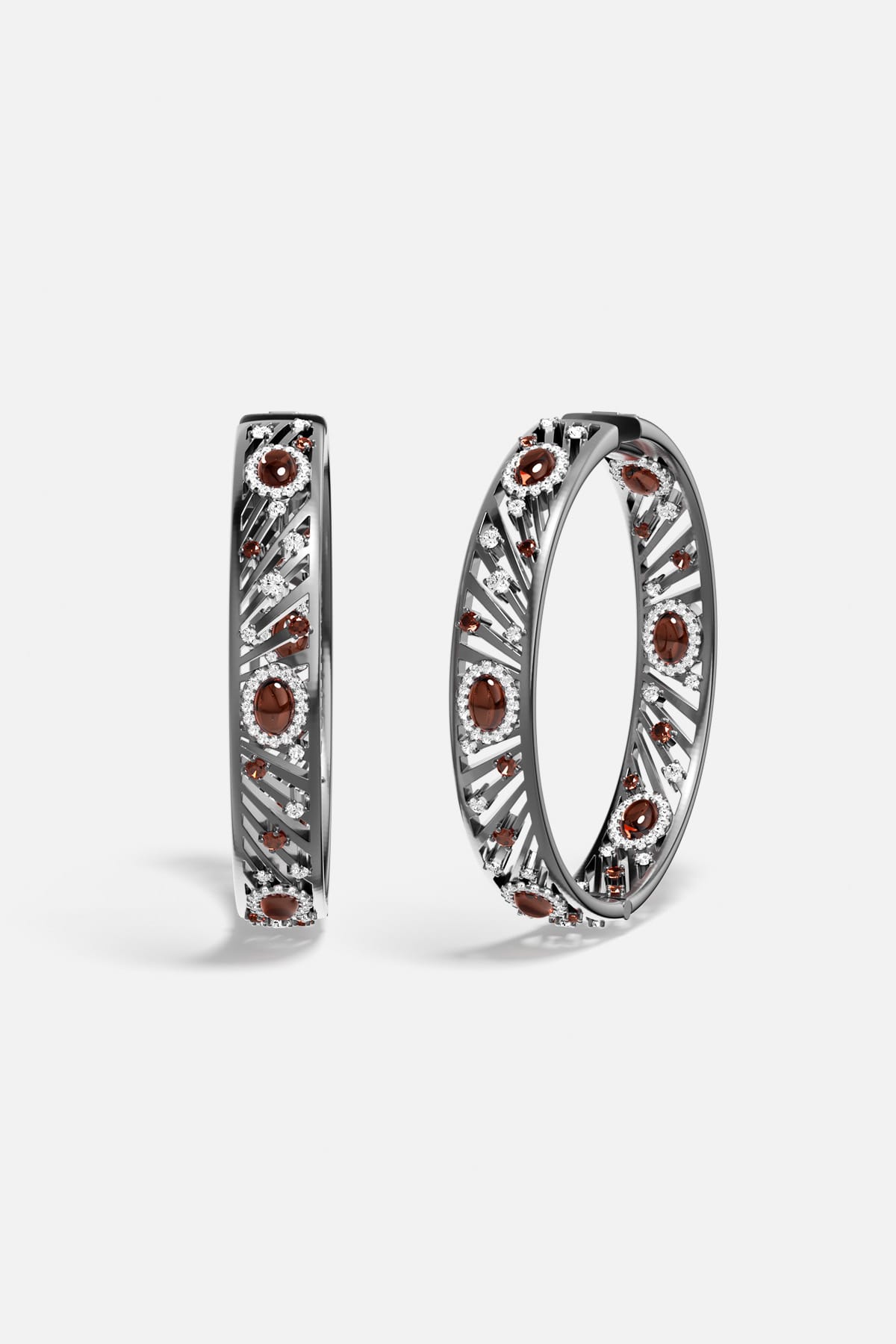 APM Hoop Earrings in rhodium finish, radiant with deep garnet colors and quiet audacity.