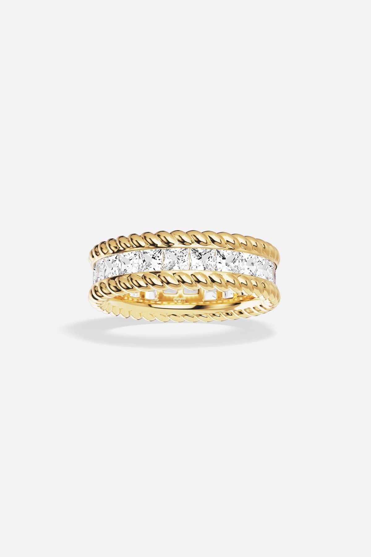 APM Ring in gold color, twisted edges framing a luminous crystal path.