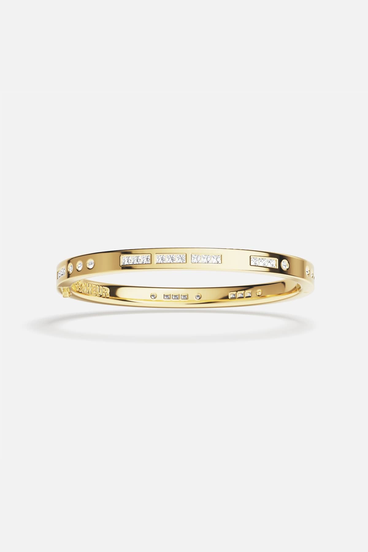 APM Bangle in golden hue, sparkling rhythm meets effortless elegance.