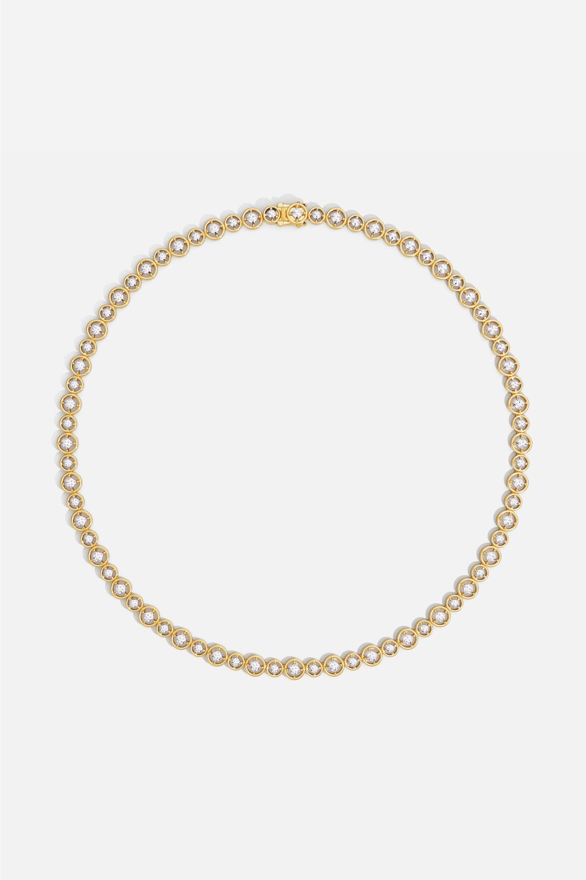APM Necklace, a golden constellation of light circling the neck with quiet radiance.