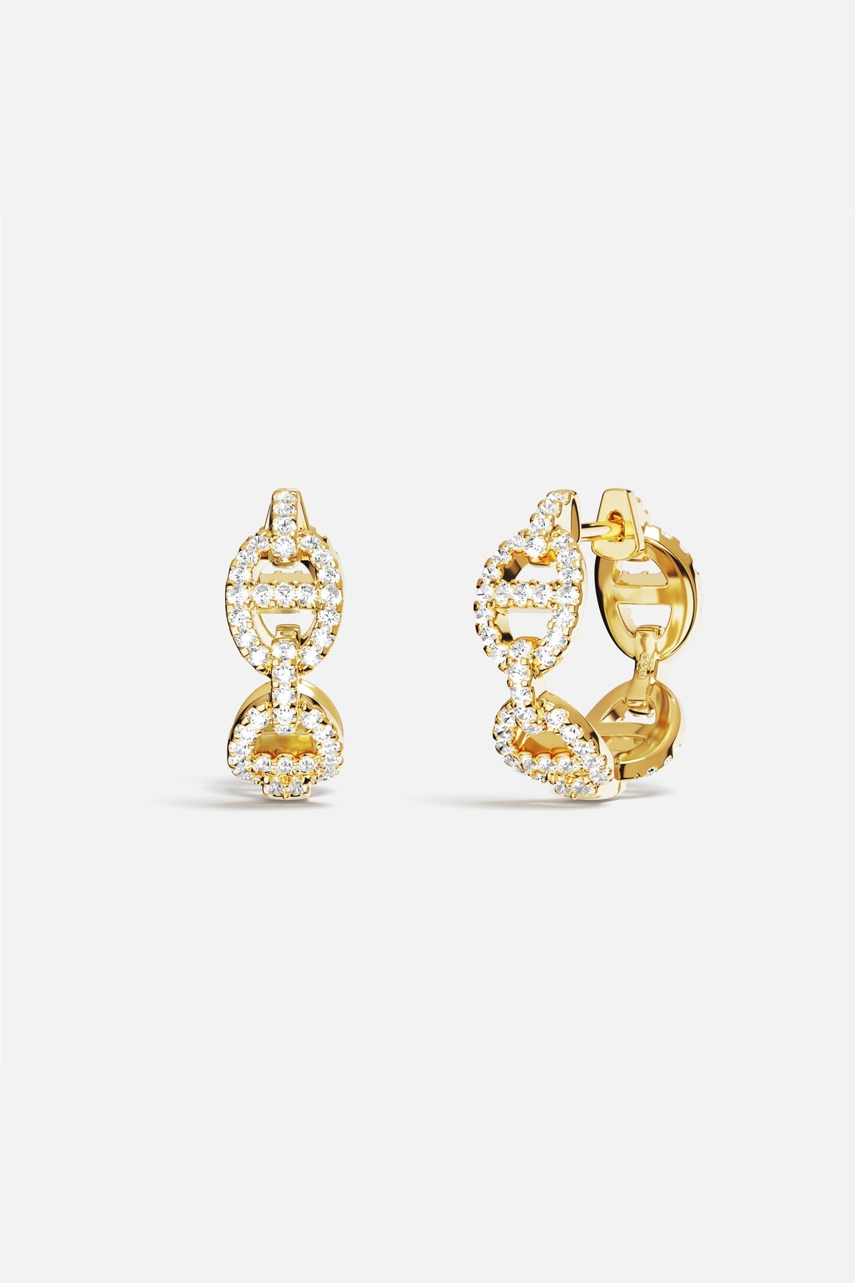 APM Marine Hoop Earrings, golden links shimmering with quiet, modern allure.