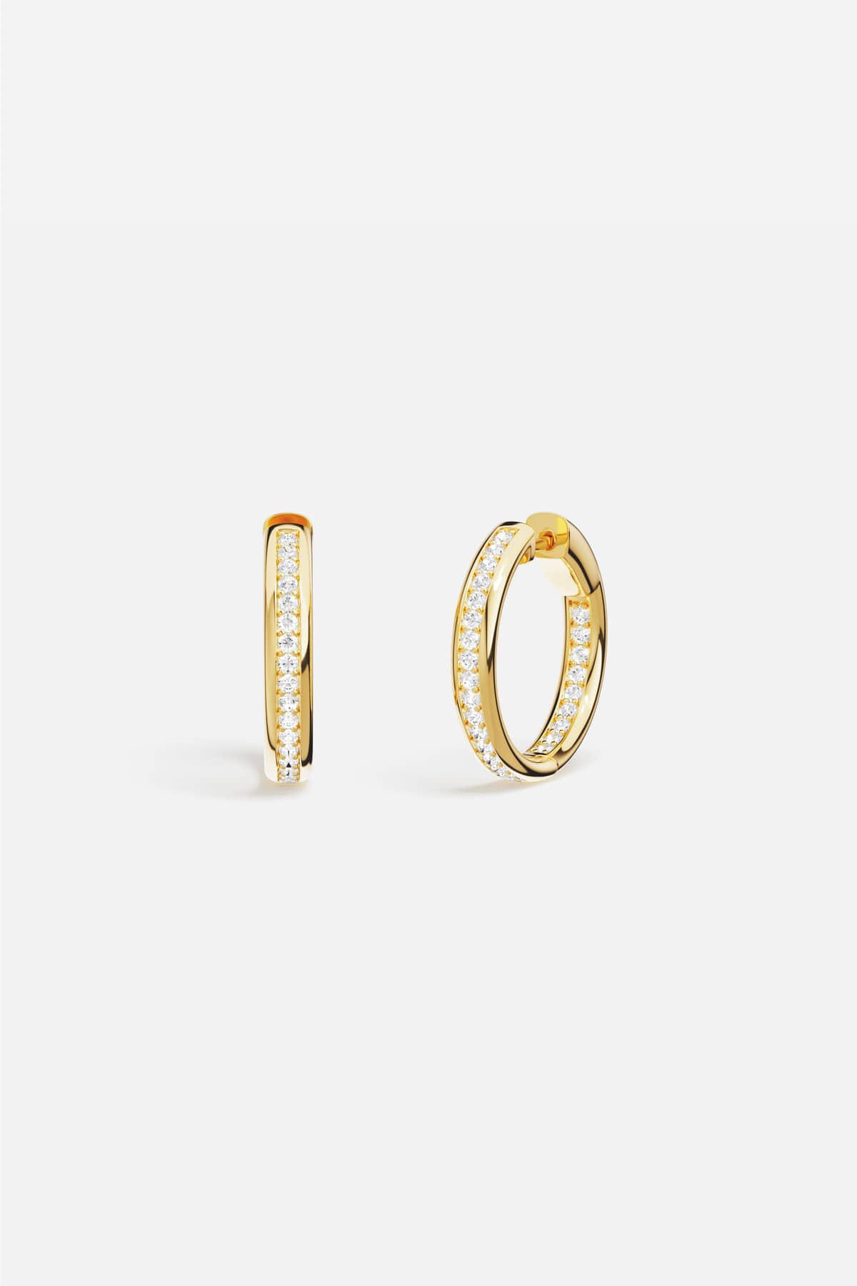 APM Hoop Earrings in golden hues, a luminous everyday essential with quiet elegance.