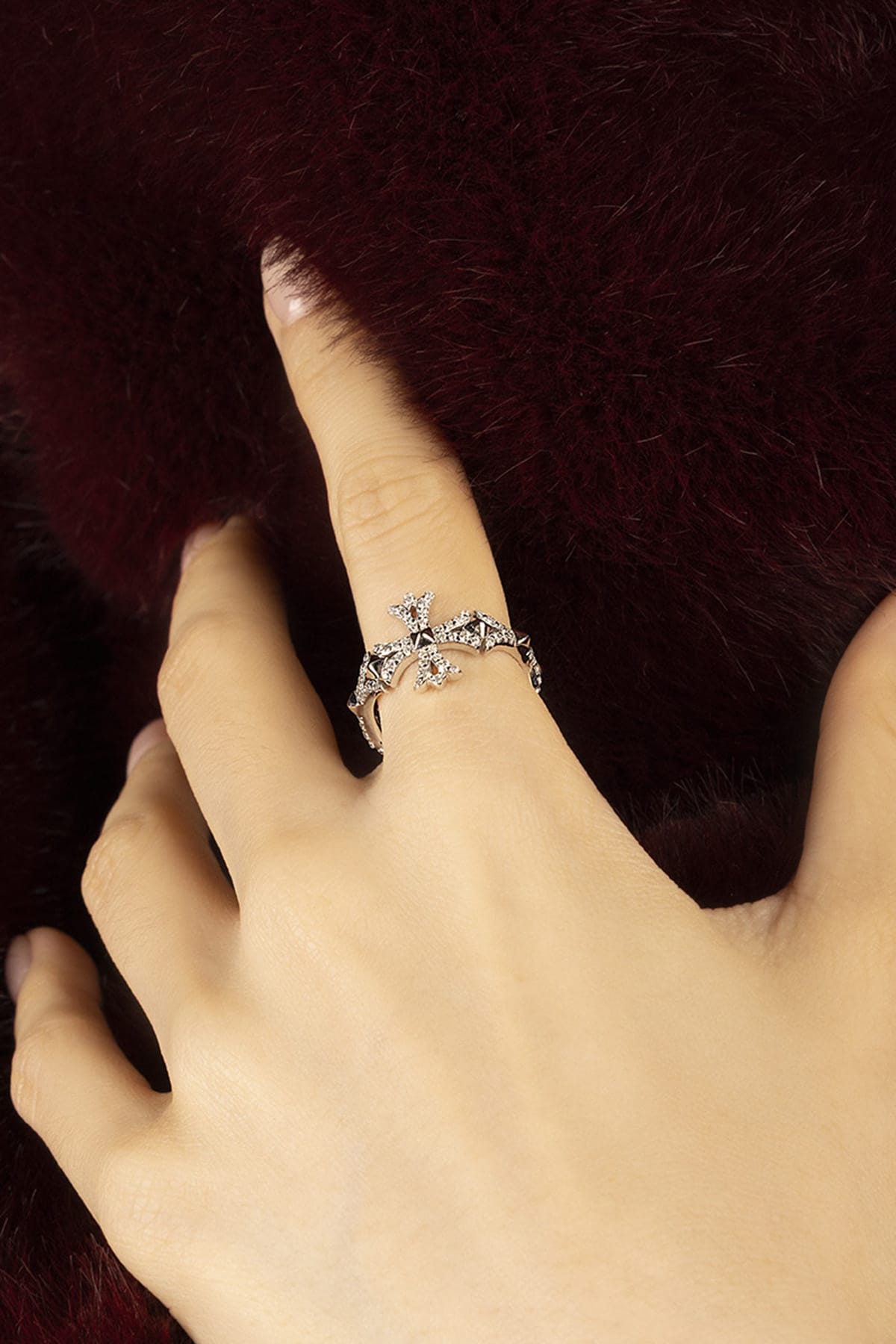 Woman wearing APM Morse Ring, a delicate sparkle whispering quiet elegance.
