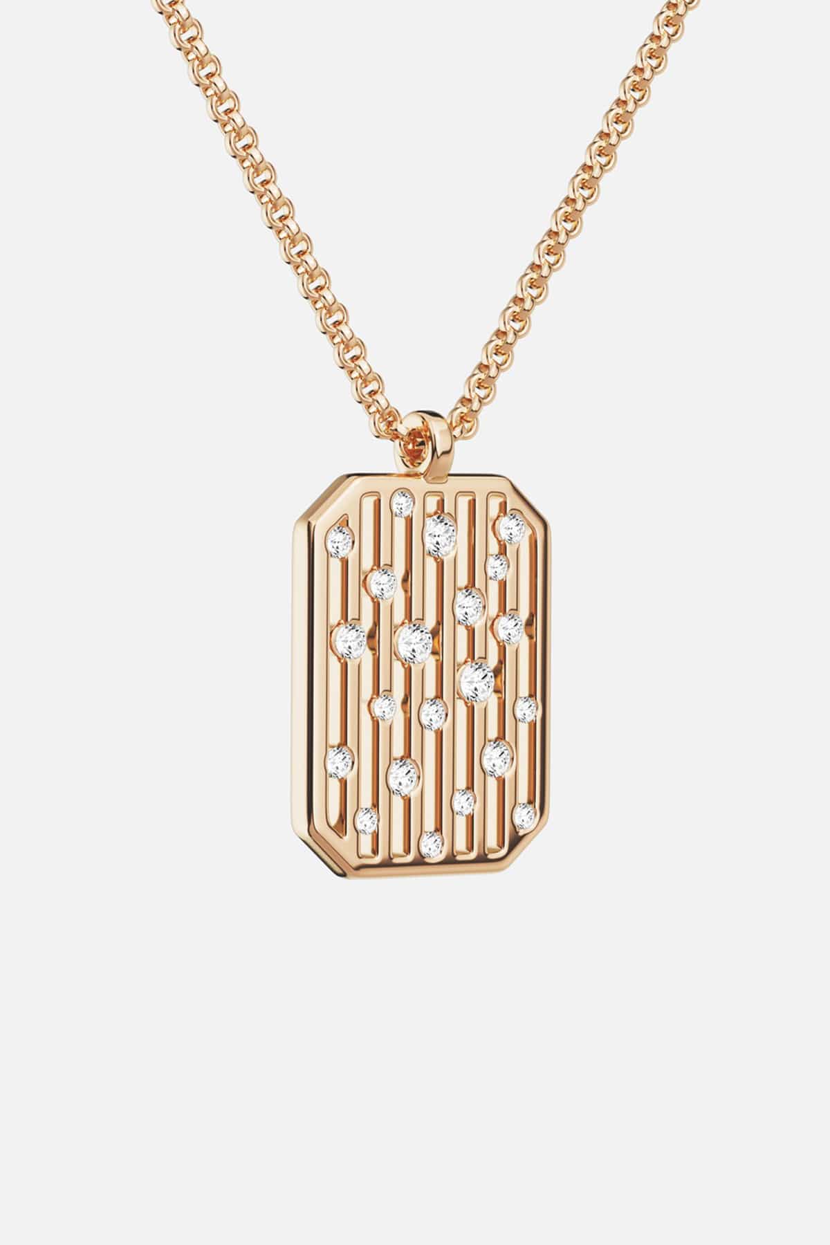 APM Monaco pendant necklace in warm gold color, scattered with quiet sparkle.