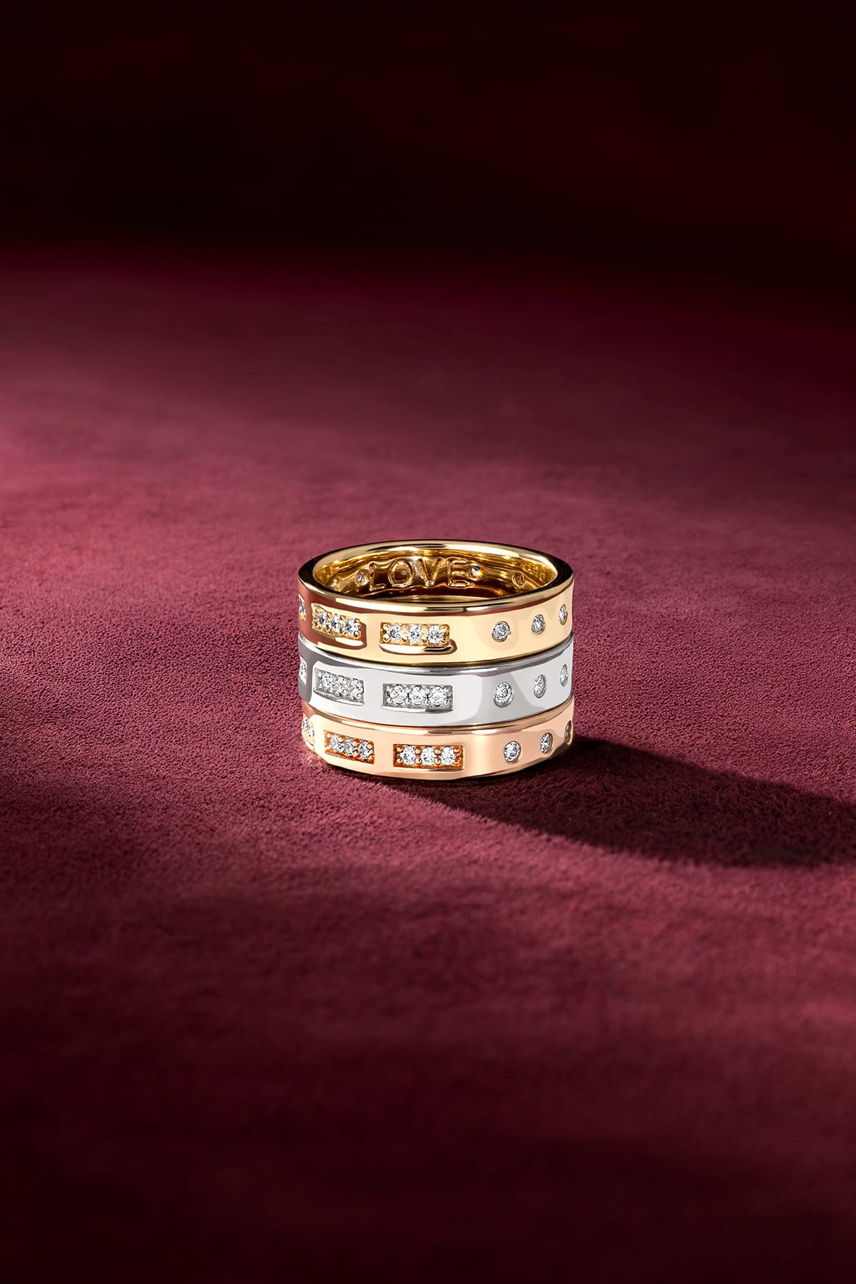 APM Rings stacked in three colors, a shimmering love story to layer.