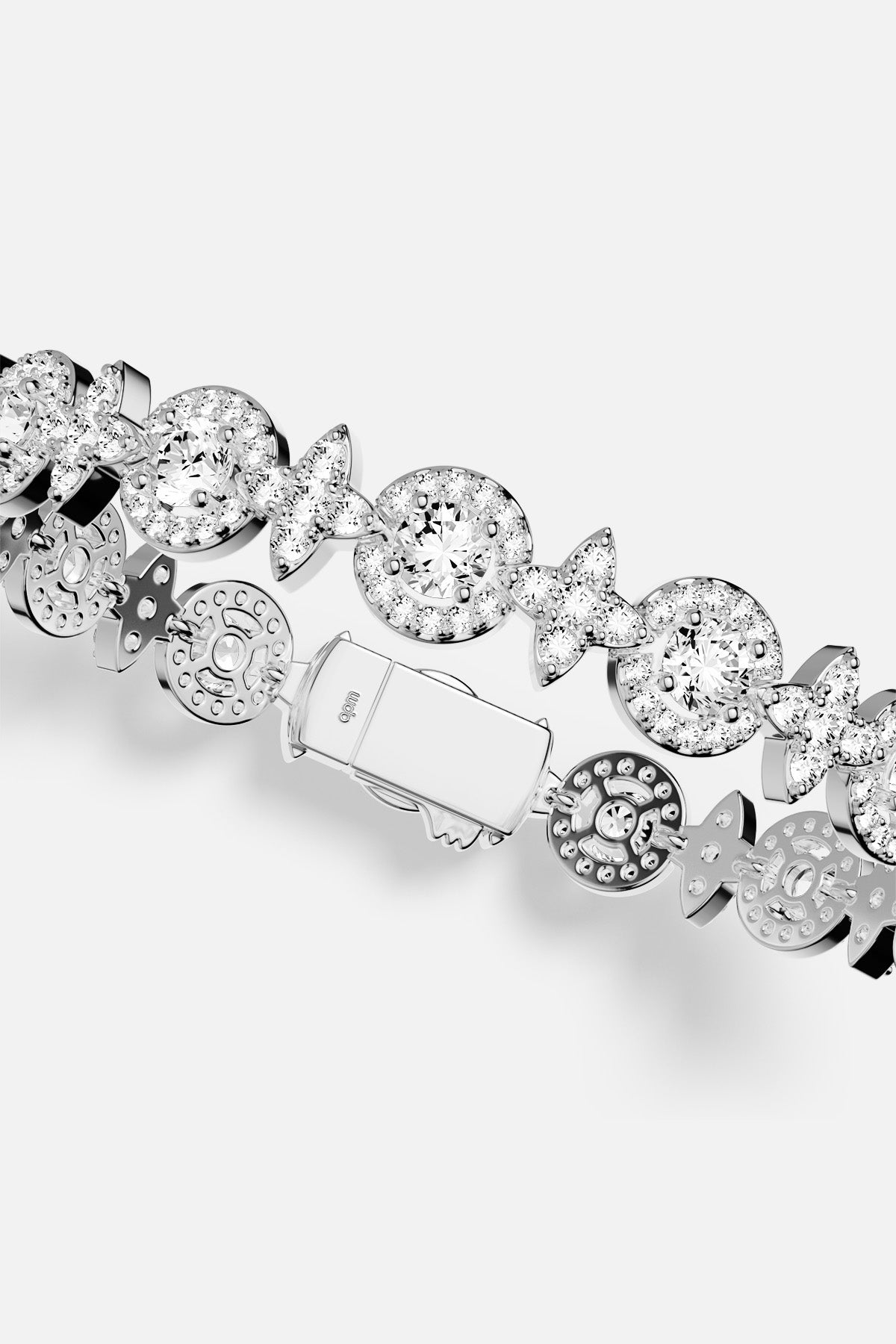 APM Bracelet, a radiant cascade of light with rhodium finish brilliance.