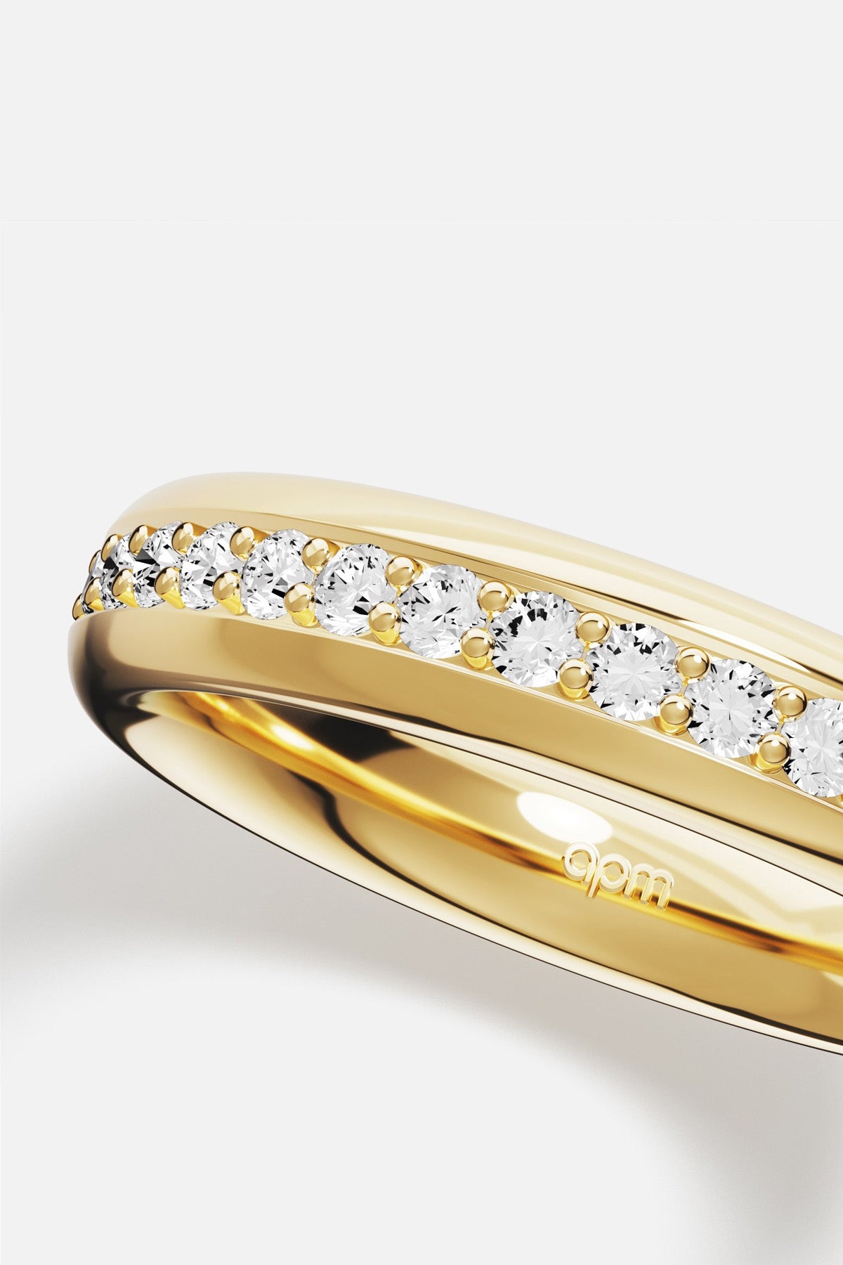 APM Ring in golden color, a luminous line of brilliance for effortless elegance.