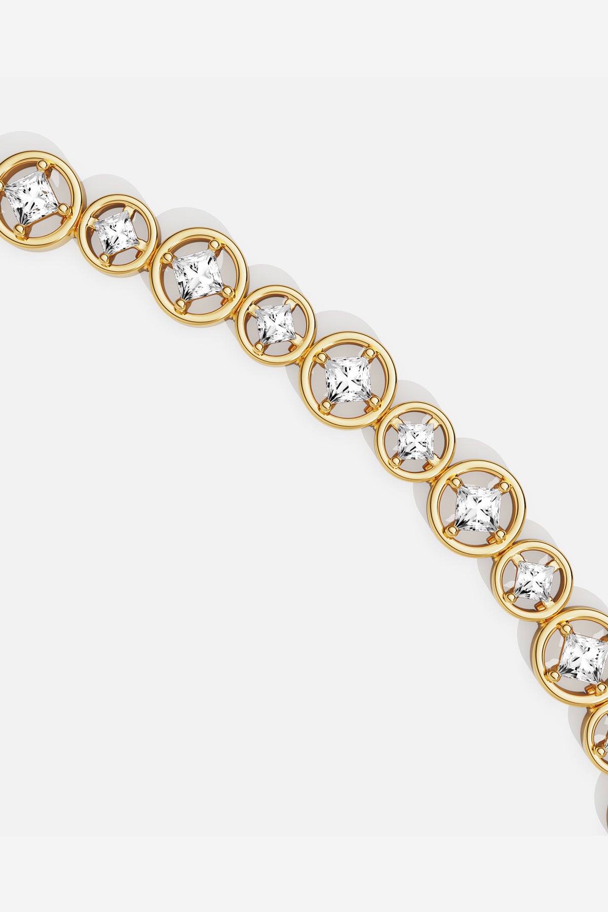 APM Bracelet in golden circles, a radiant rhythm of understated glamour.