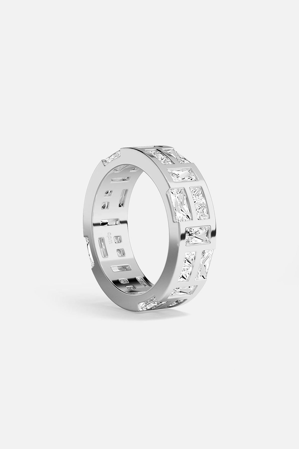 APM Ring in rhodium finish, an architectural play of light and modern elegance.