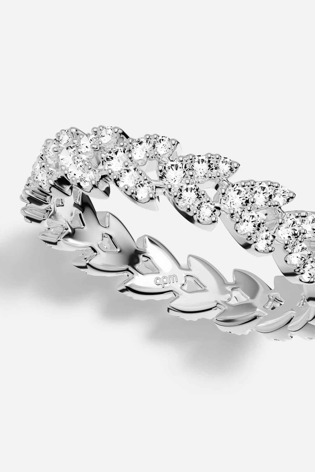 APM Ring in rhodium finish, a shimmering laurel whispering timeless elegance.