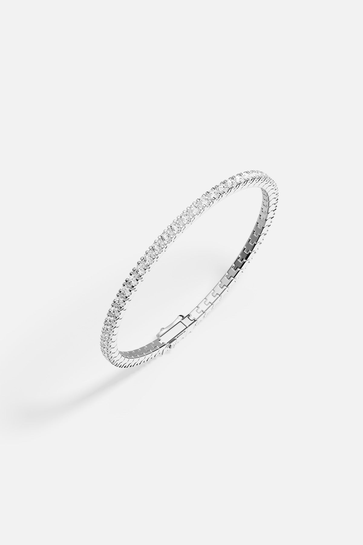 APM Tennis Bracelet in rhodium finish, effortless brilliance for every day.
