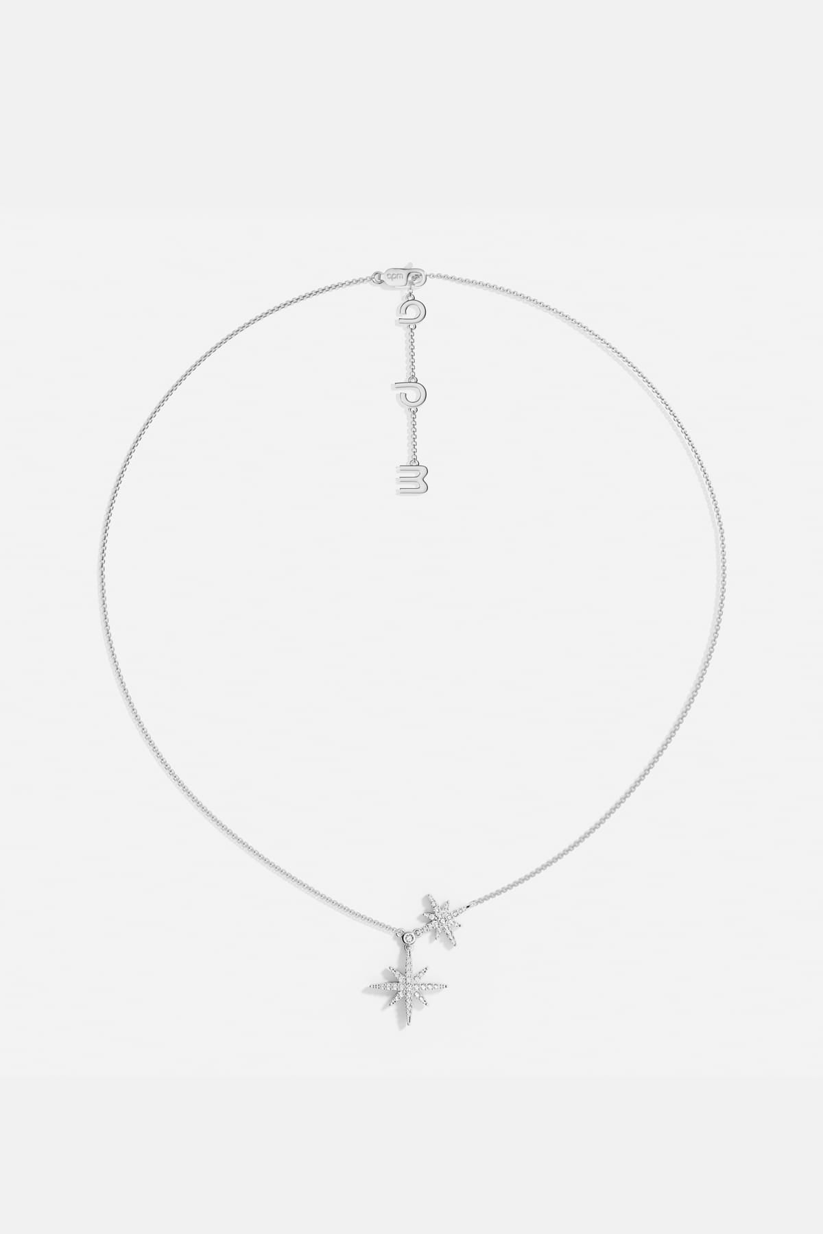 APM Météorites Necklace, twin stars shimmering in rhodium finish, celestial and effortless.