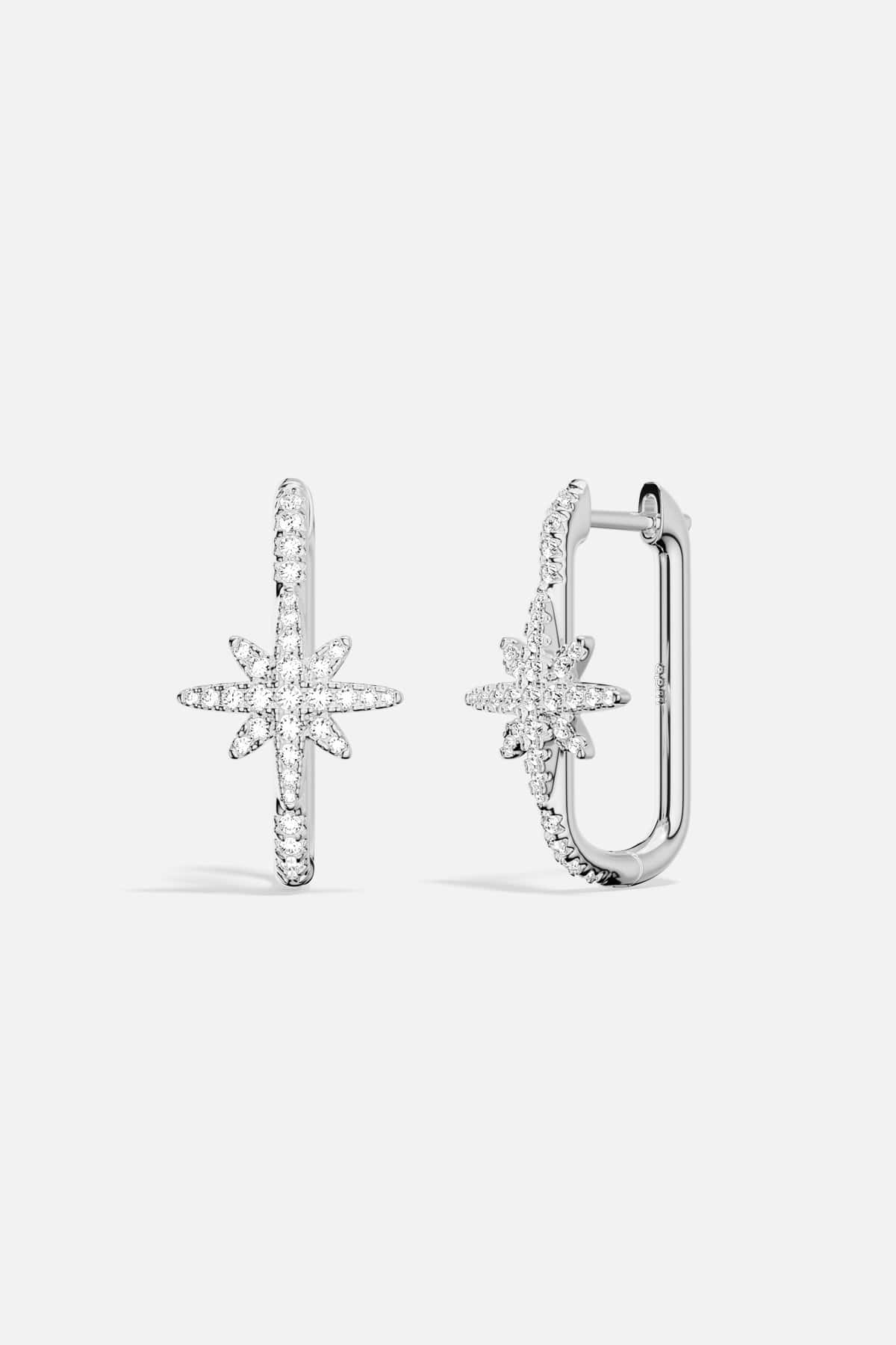 APM Météorites Earrings, a celestial sparkle in rhodium finish, effortlessly luminous.