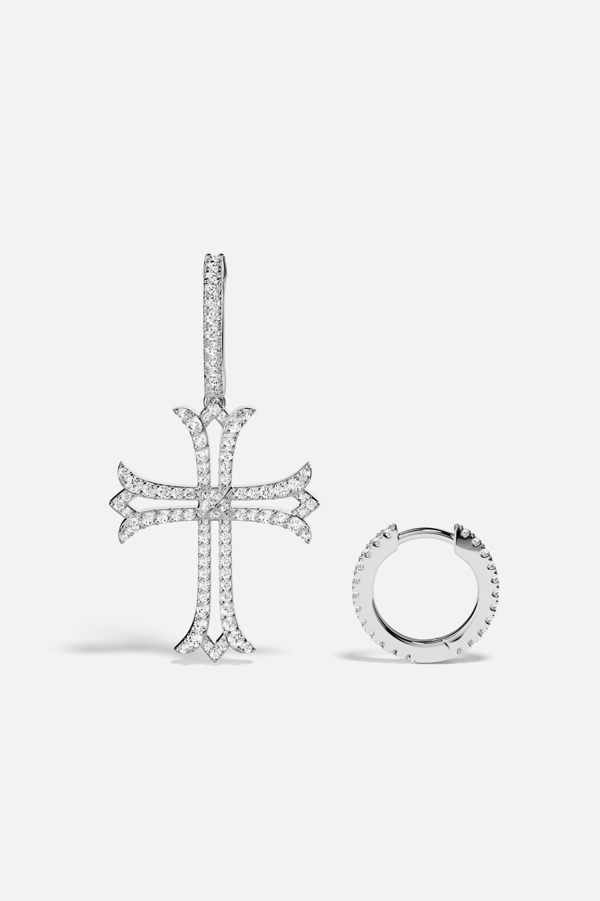 APM cross earrings in rhodium finish, a bold gothic whisper of modern elegance.