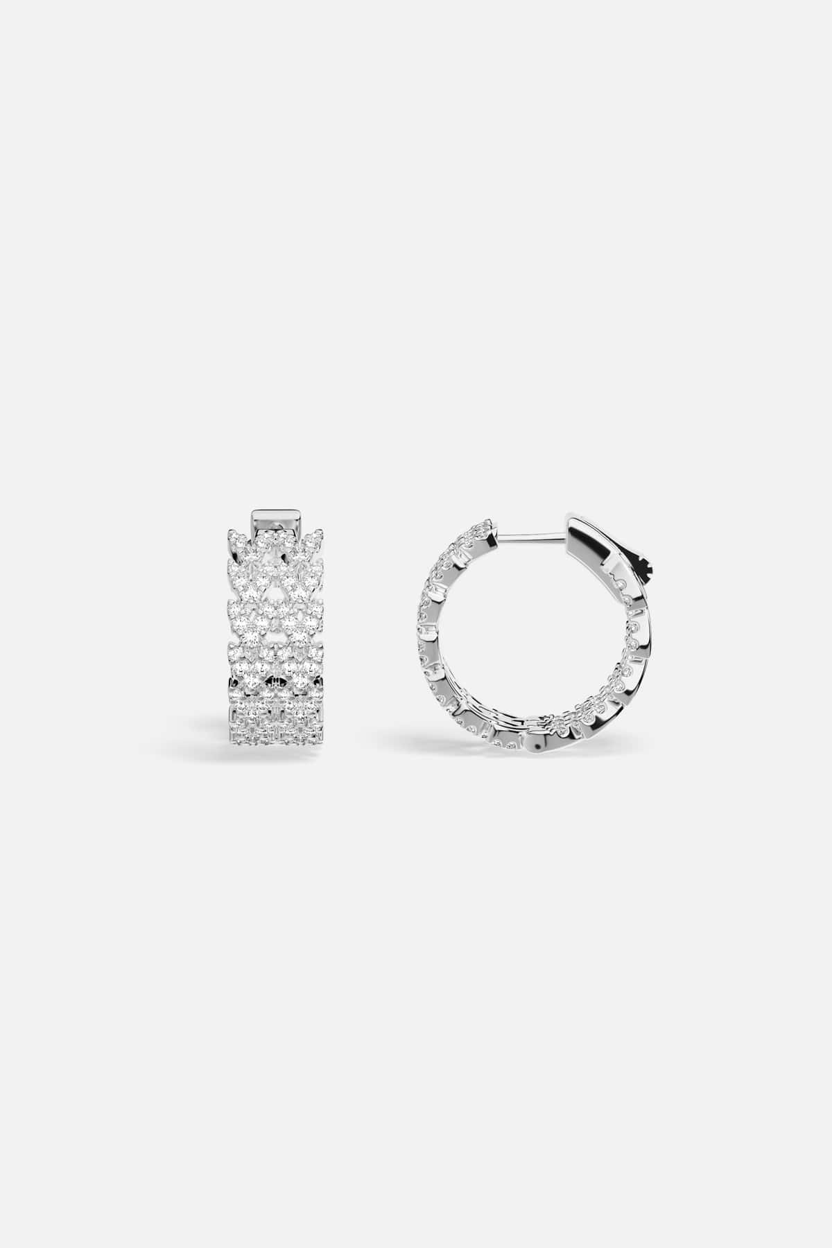 APM Hoop Earrings shimmering with pavé brilliance, effortless radiance in rhodium finish.