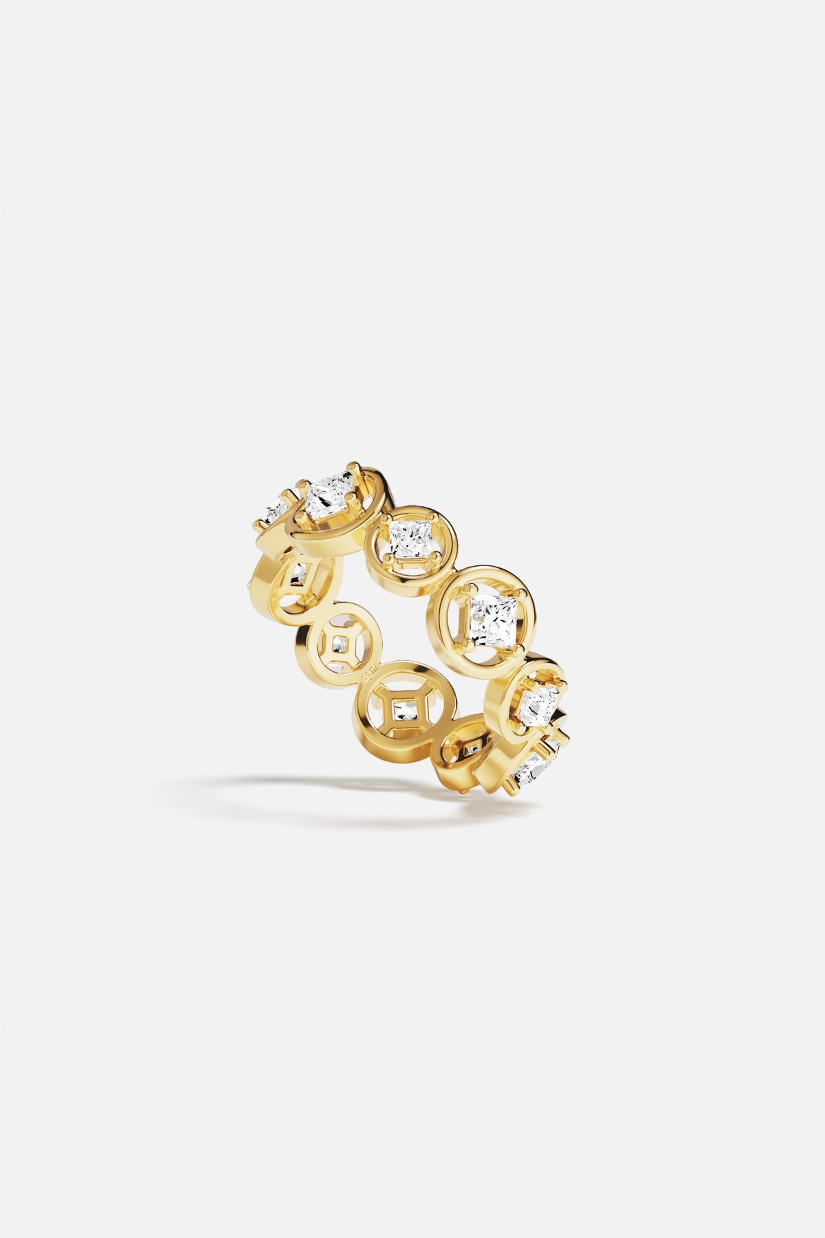 APM Ring in golden color, luminous circles and stones, a playful modern charm.