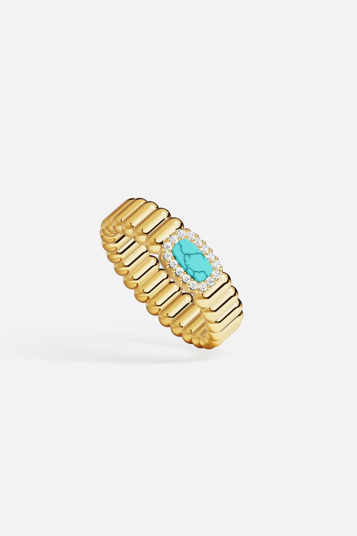 APM Ribbed Ring in golden hue, a turquoise glow for effortless summer allure.