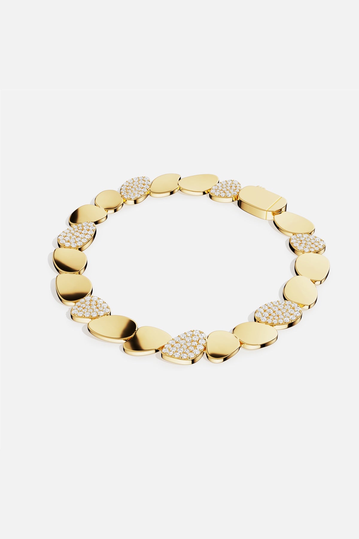 APM Monaco bracelet in golden pebbles, a luminous rhythm of shine and sparkle.