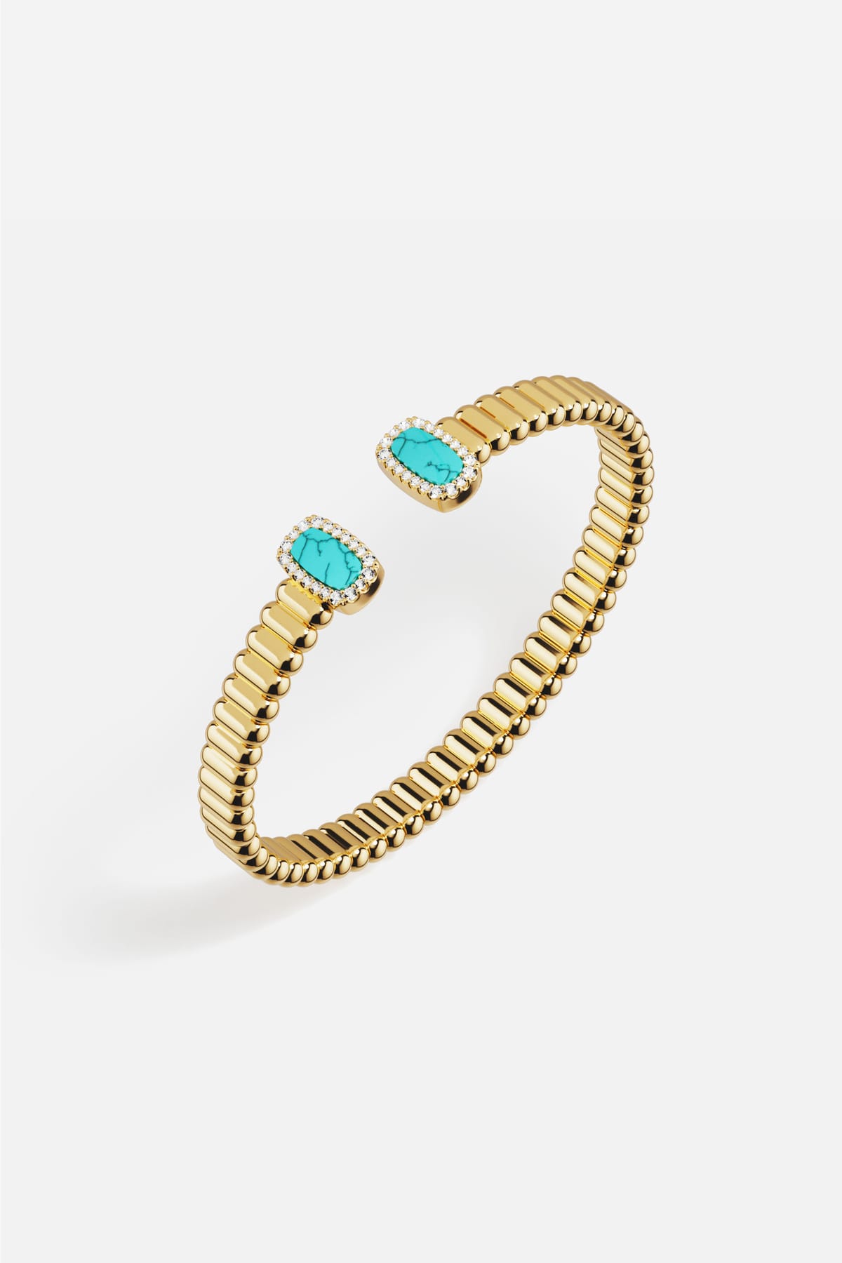 APM Bangle in golden hues, turquoise accents whispering a breezy Riviera charm.
