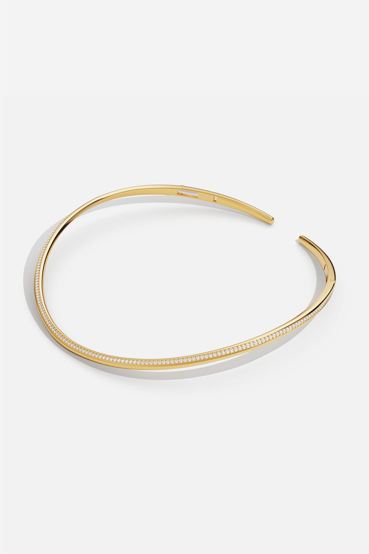 APM Choker in gold color, a sleek curve of modern elegance.