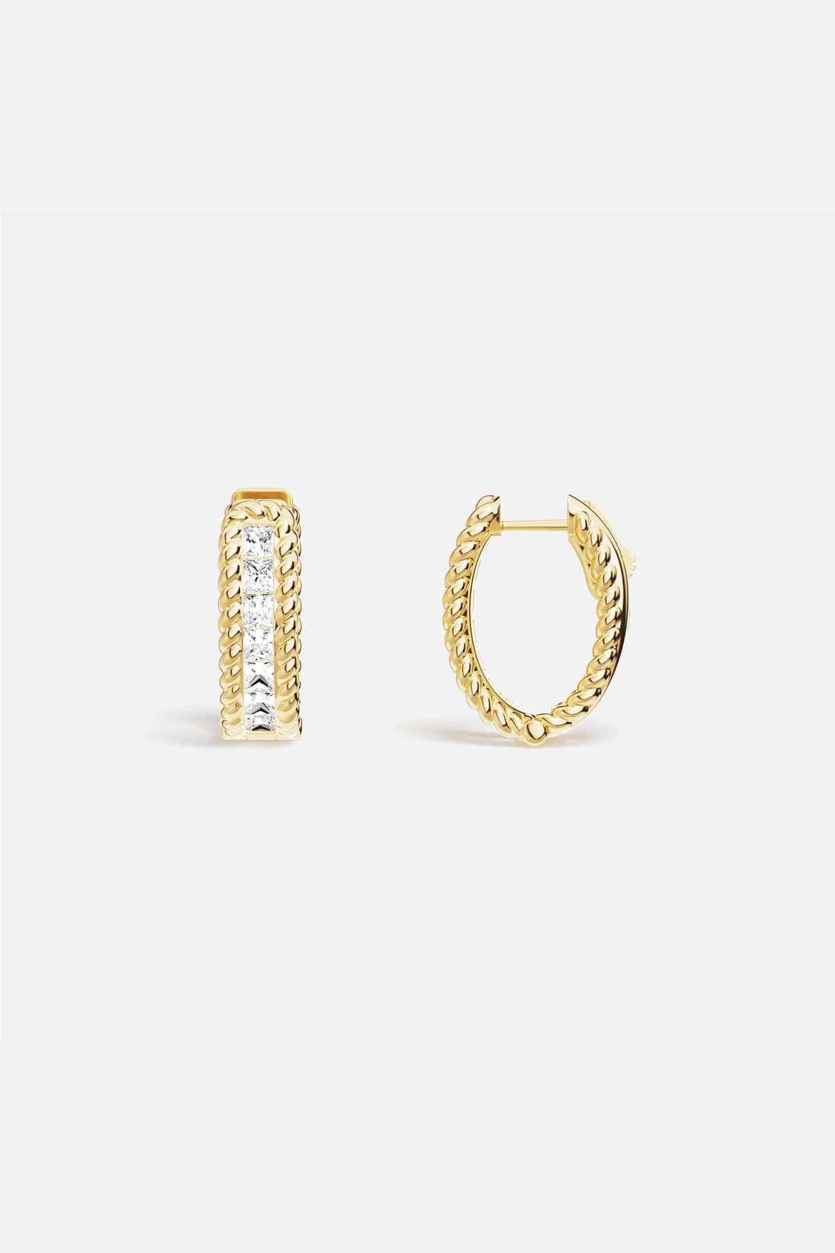 APM Hoop Earrings, twisted golden ropes framing a luminous line of light.
