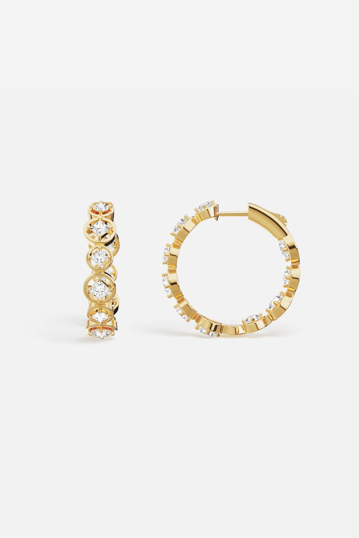 APM Hoop Earrings in golden color, radiant sparkle circling every moment with quiet elegance.