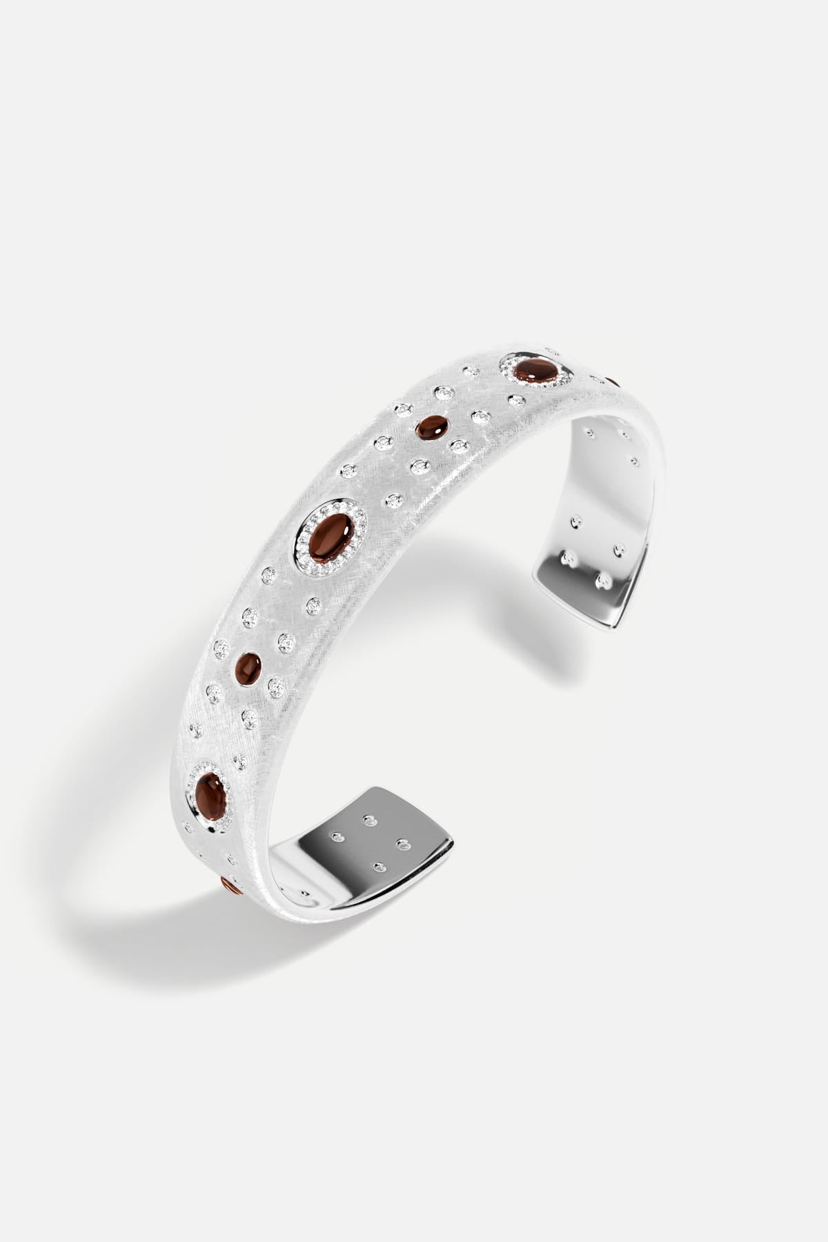 APM Cuff Bracelet, brushed rhodium finish scattered with warm amber constellations.