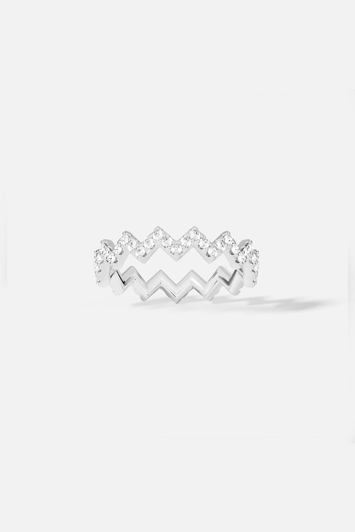 Rings APM Monaco, white pavé zig-zag ring with small rhinestones.