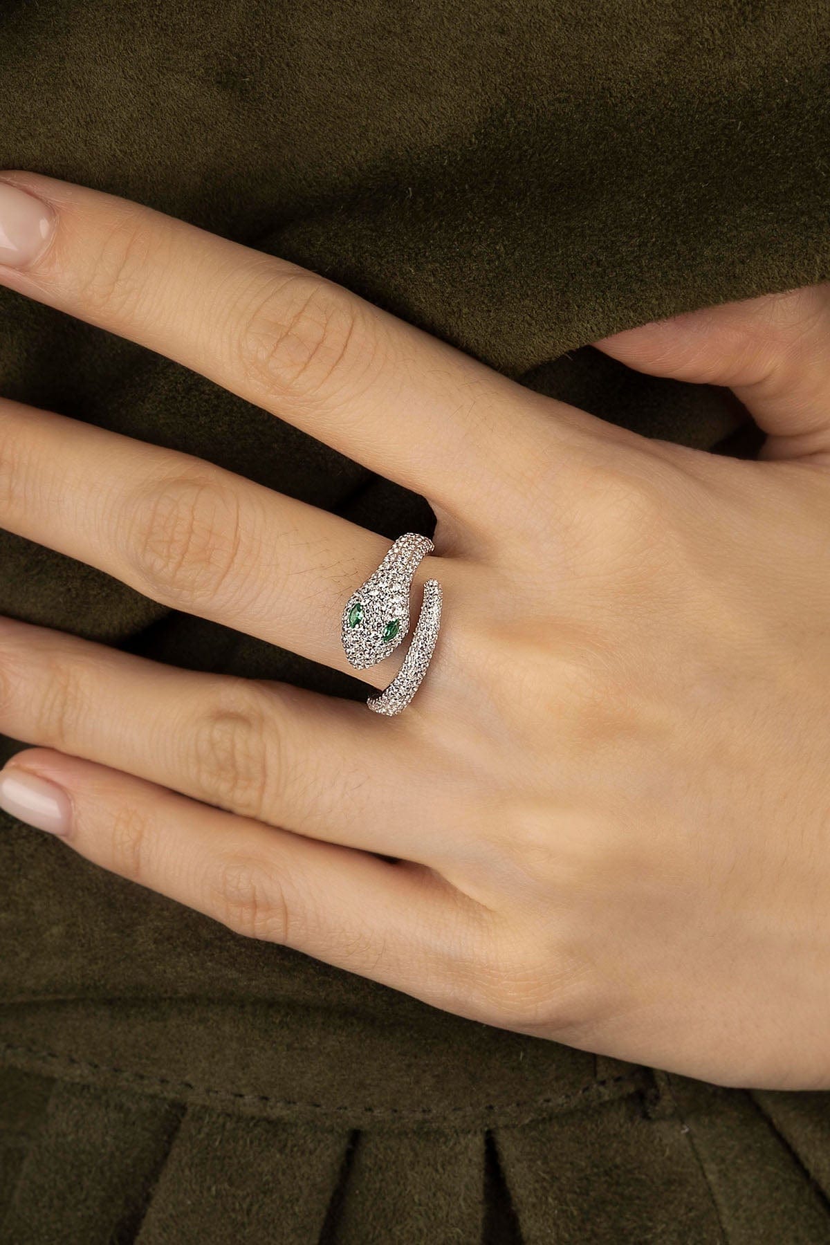 APM Kaa Wrap Ring in silver worn on hand