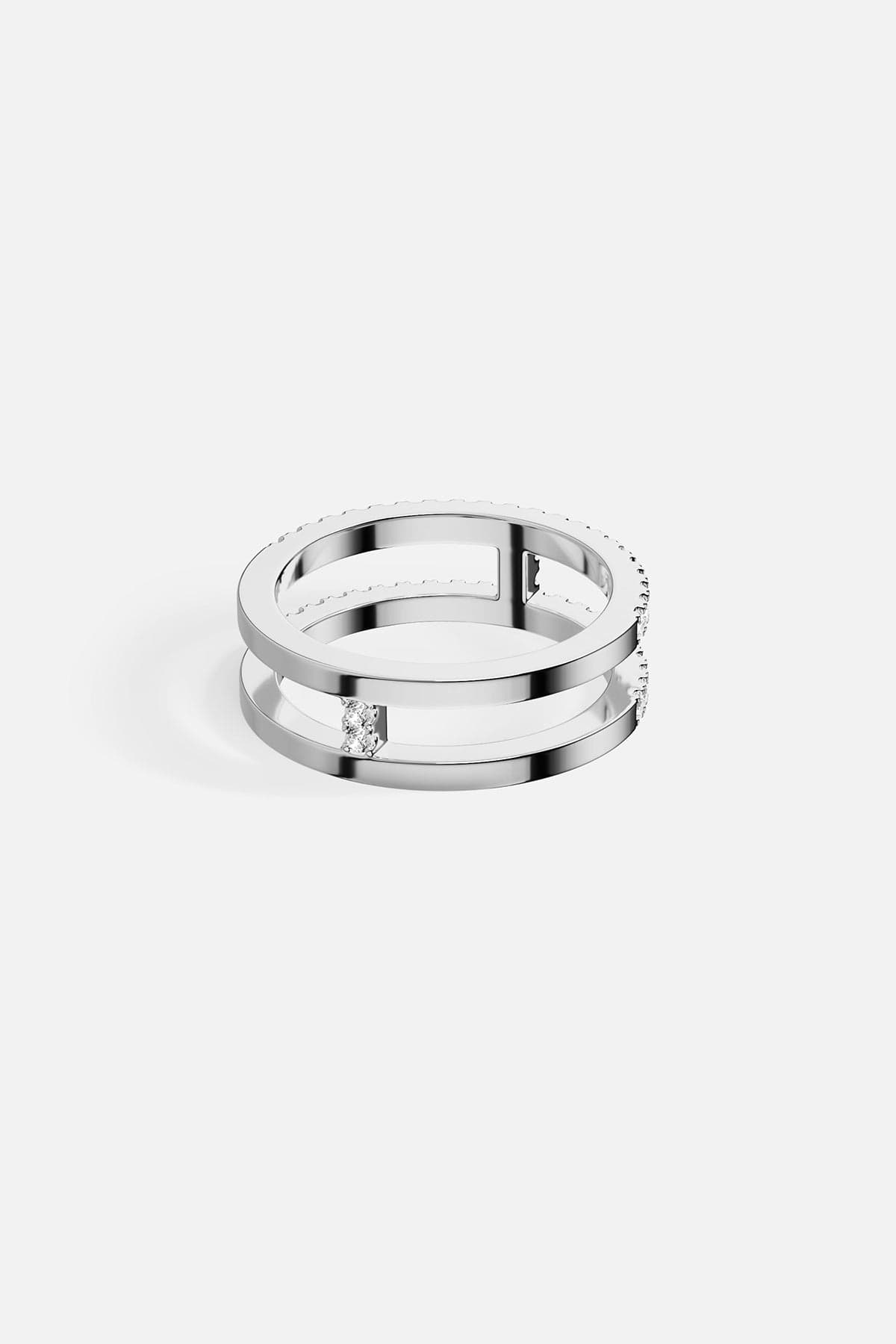 Rings APM Monaco: silver-toned ring with double pavé rows of small clear stones and two horizontal bars.