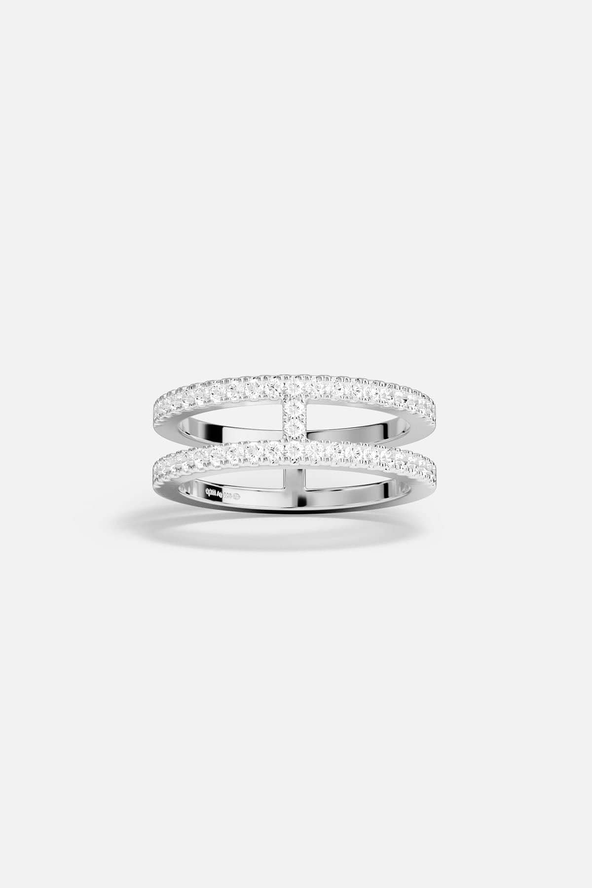 Rings APM Monaco: silver-toned ring with double pavé rows of small clear stones and two horizontal bars.