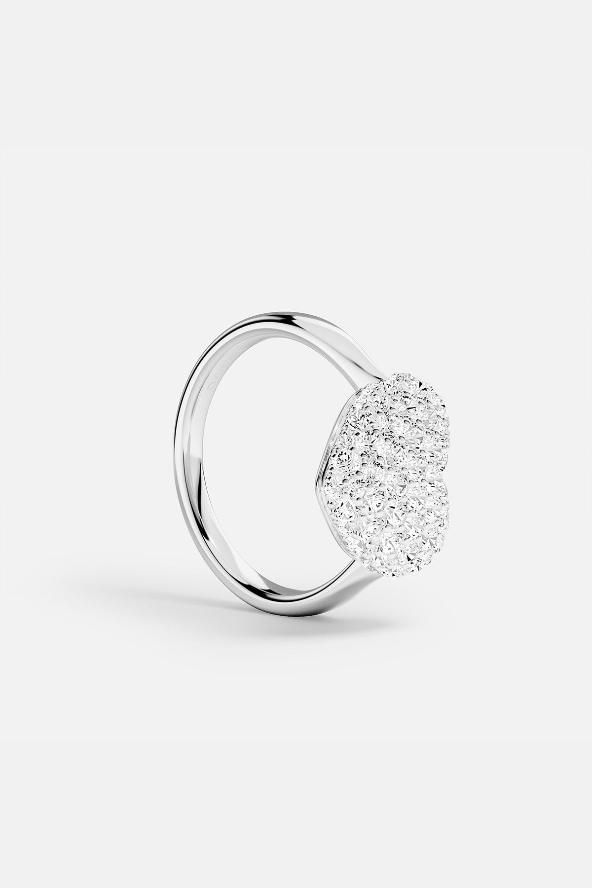 APM MONACO heart-shaped ring in silver on a white background