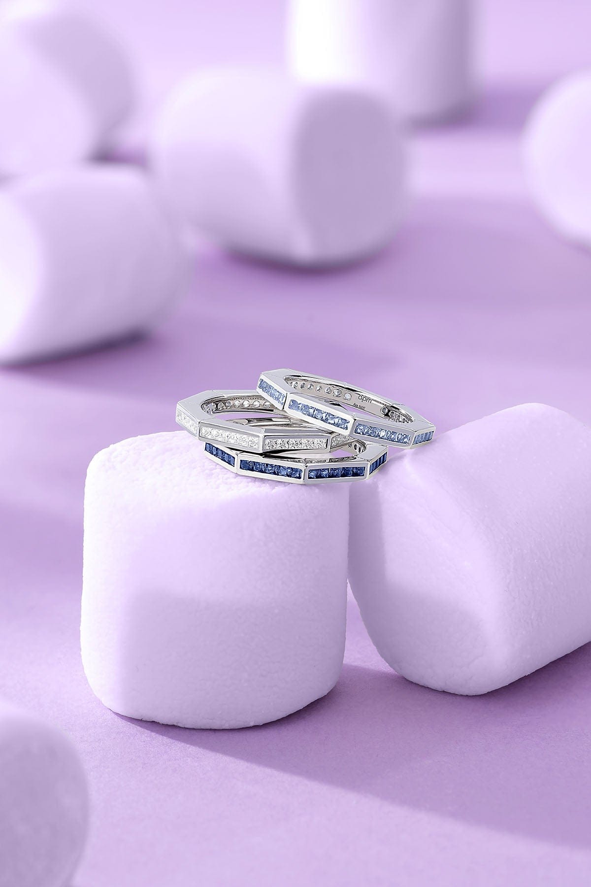 Blue Geometric Pavé Ring on a purple background