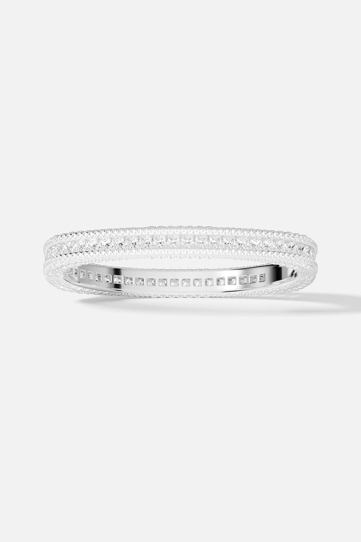 Bracelets APM Monaco pavé bangle with white diamonds set on white metal.