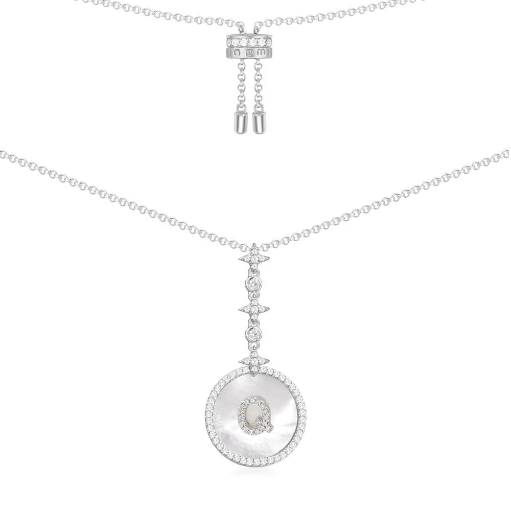 Necklaces APM Monaco: silver chain with an ornate Q pendant.