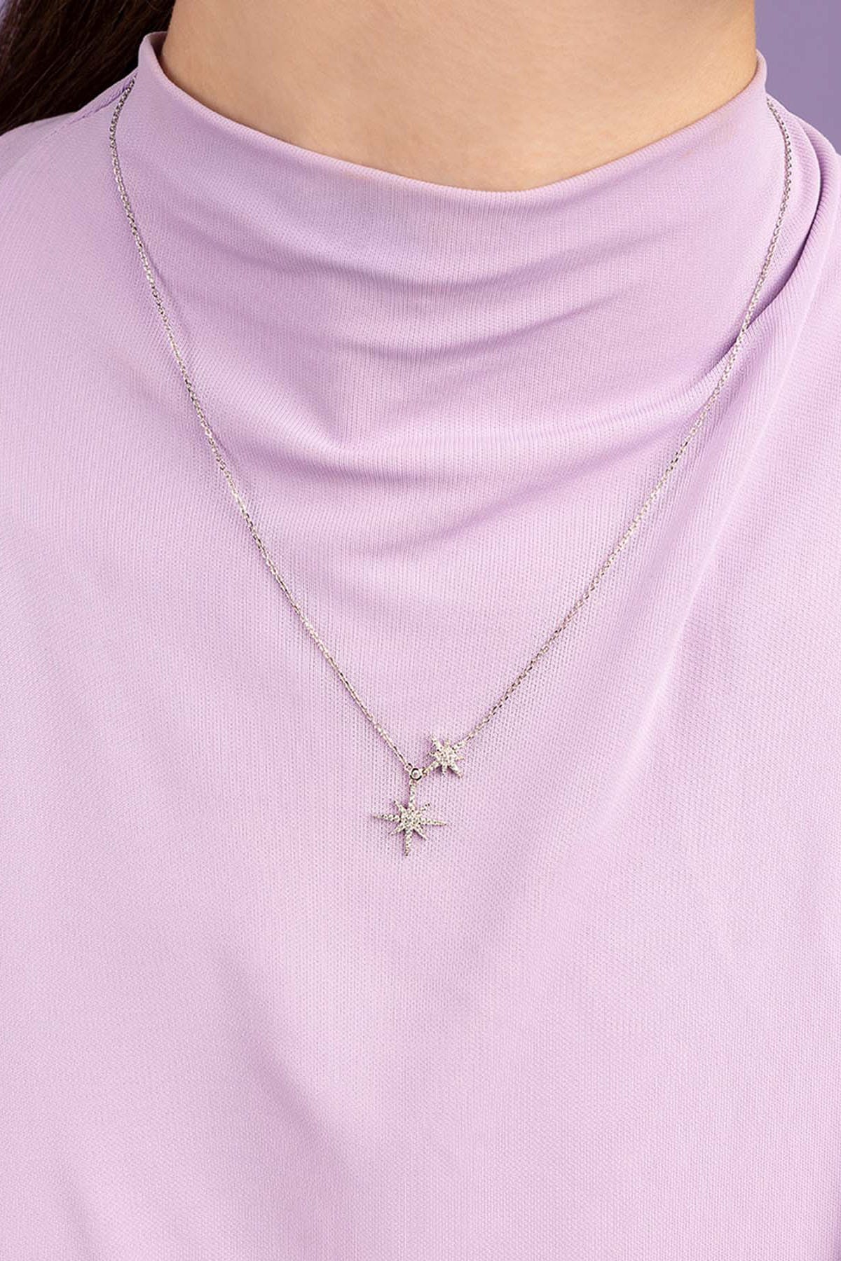 APM Monaco Double Meteorites Adjustable Necklace worn on model with lilac background