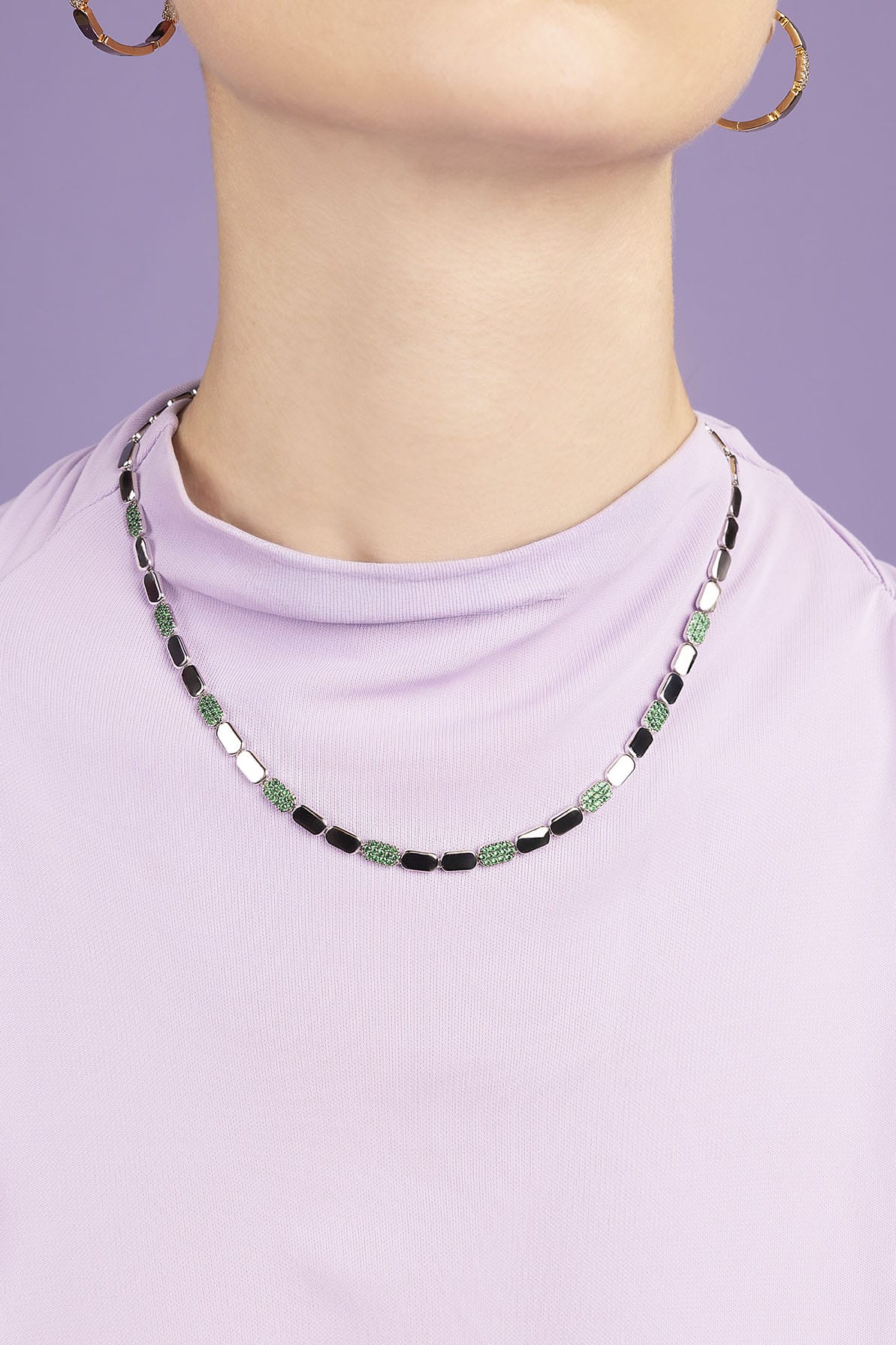 APM MONACO Dainty Adjustable Necklace worn by model on purple background