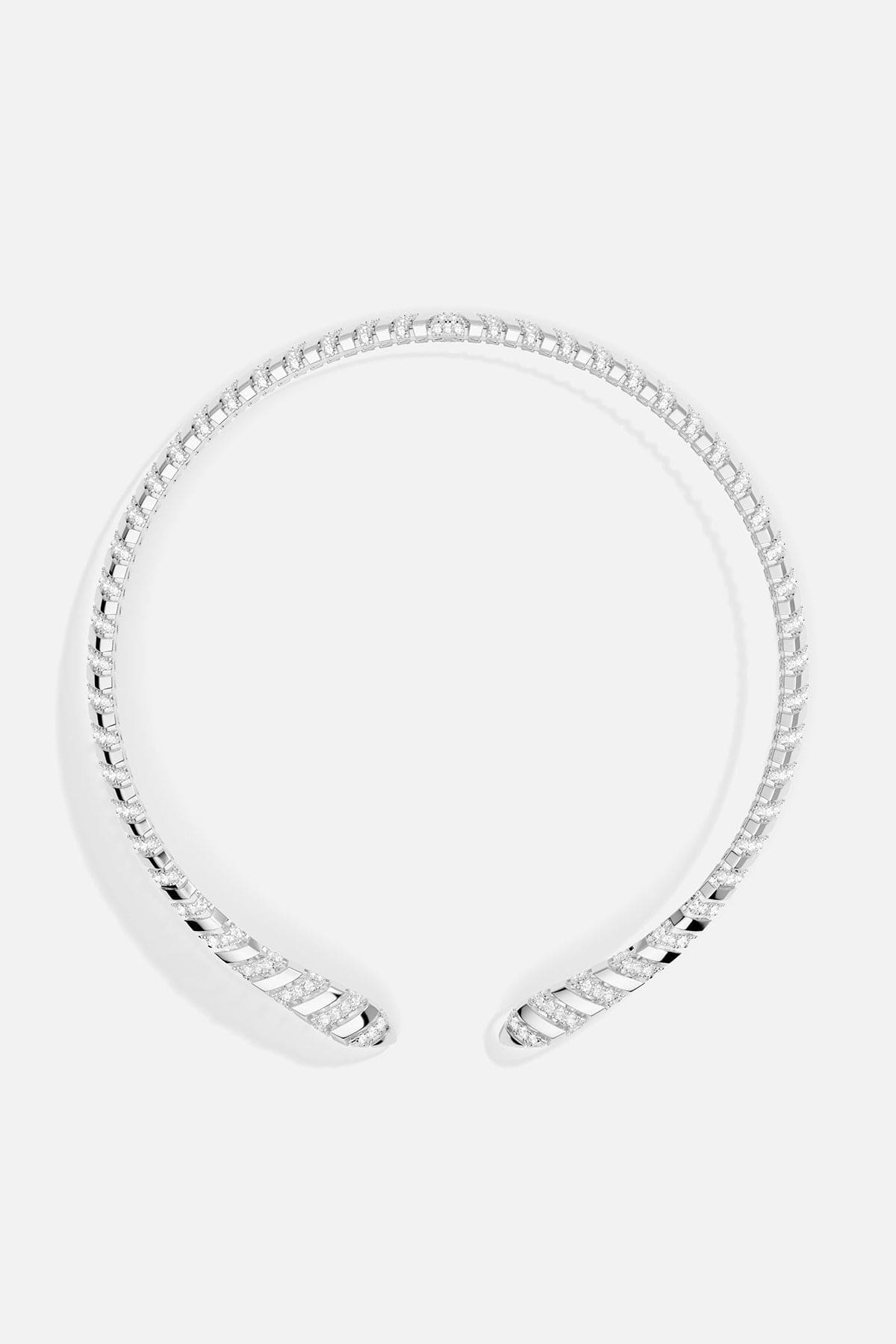 Silver bracelet on a light gray background