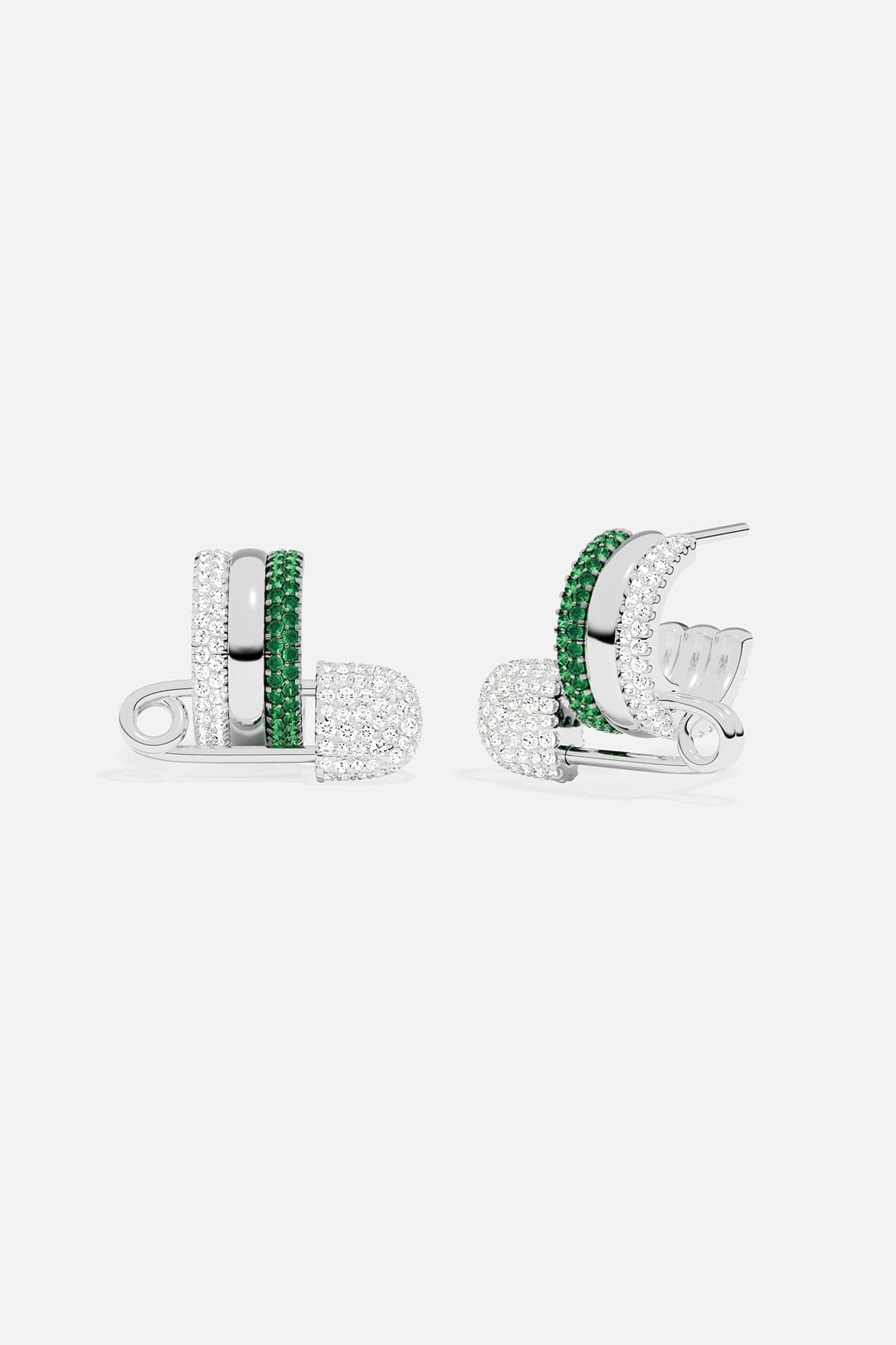 Pair of silver earrings with green stones on a white background