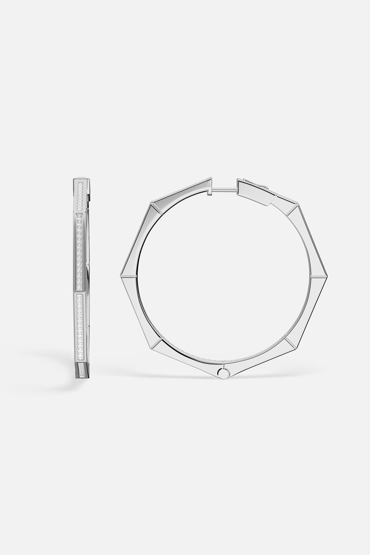 Pair of APM MONACO silver hoop earrings on a white background